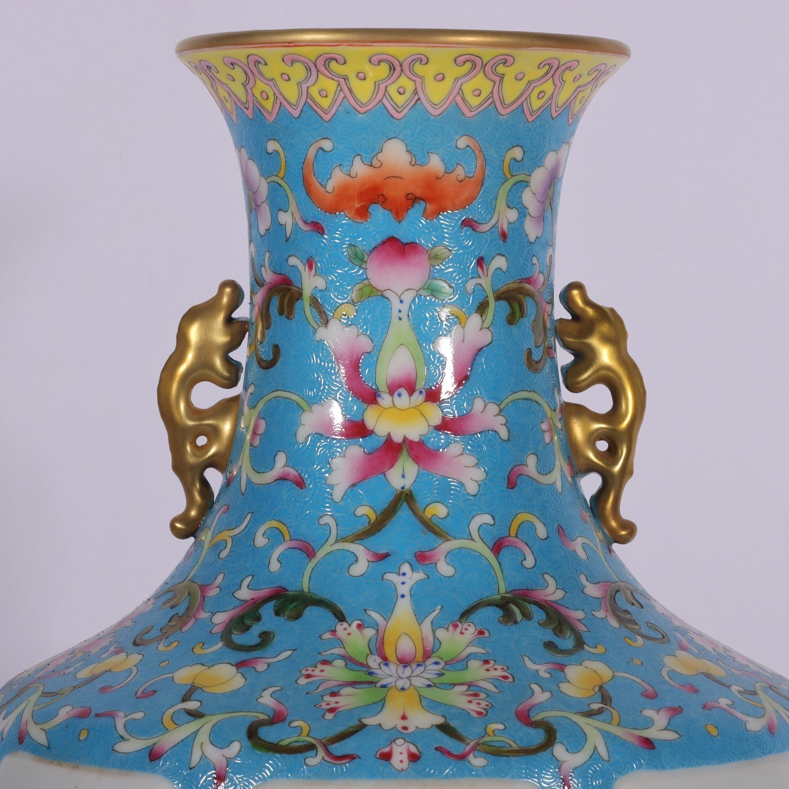 Qing Dynasty Qianlong pastel-blue ground-rolled floral poetry amphora