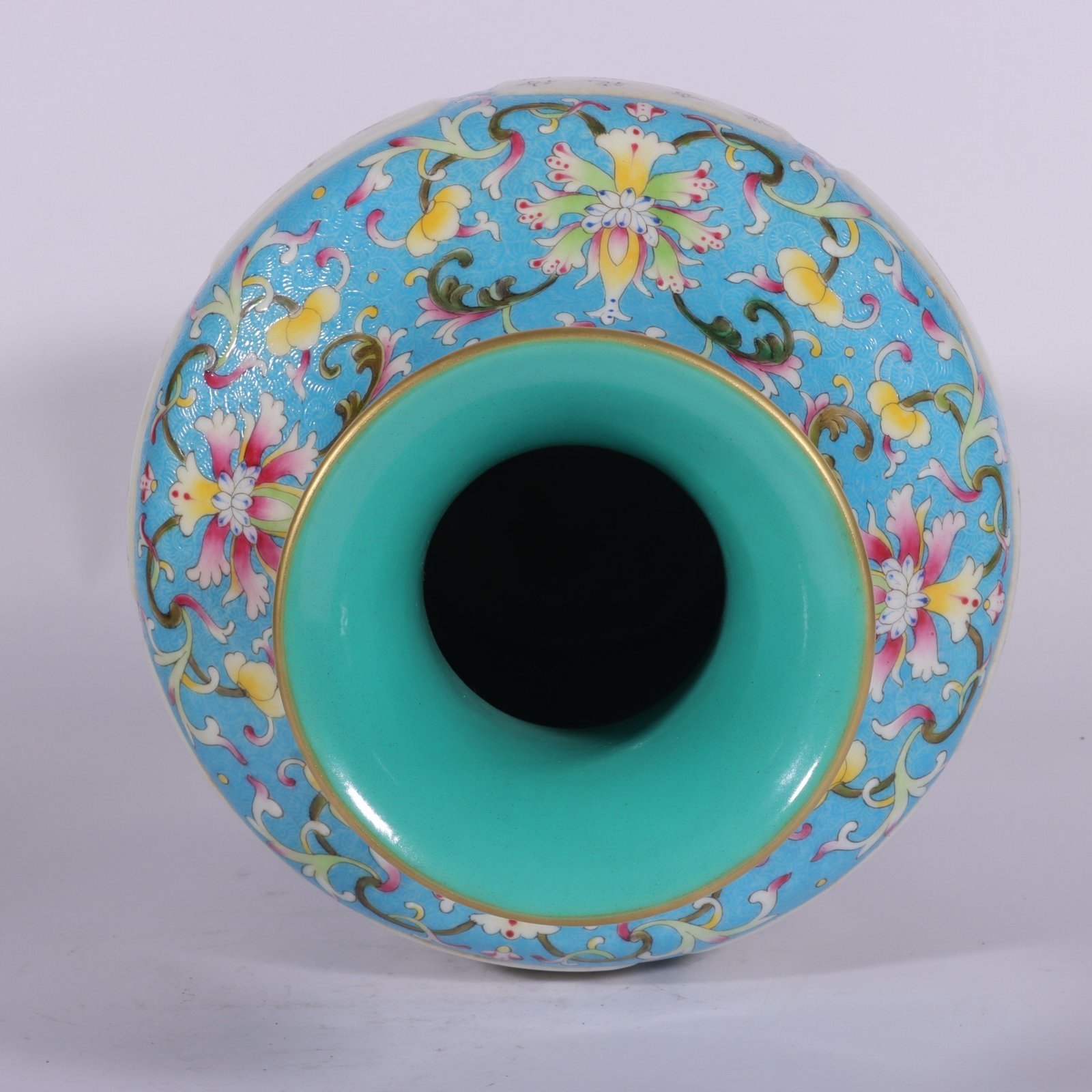 Qing Dynasty Qianlong pastel-blue ground-rolled floral poetry amphora