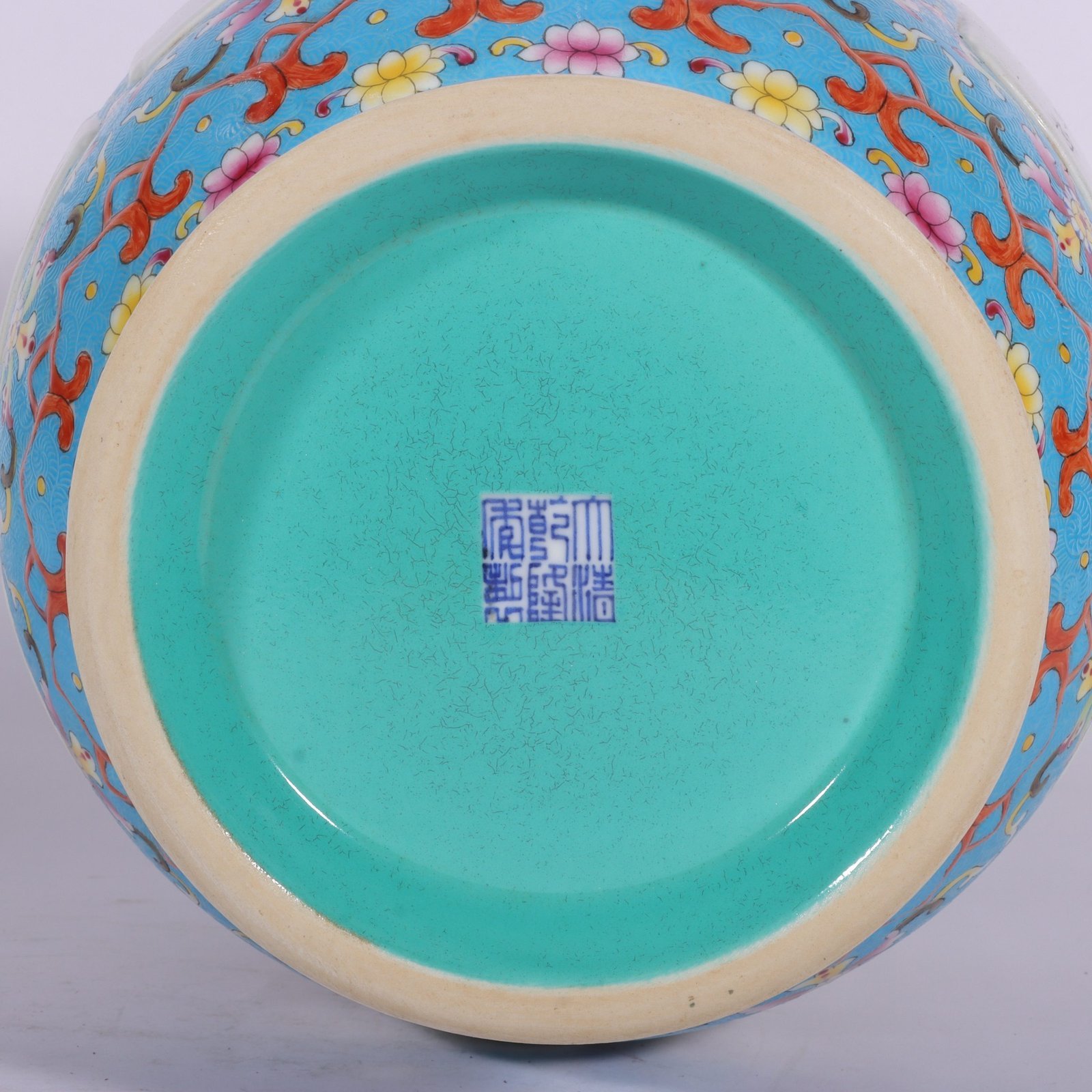 Qing Dynasty Qianlong pastel-blue ground-rolled floral poetry amphora