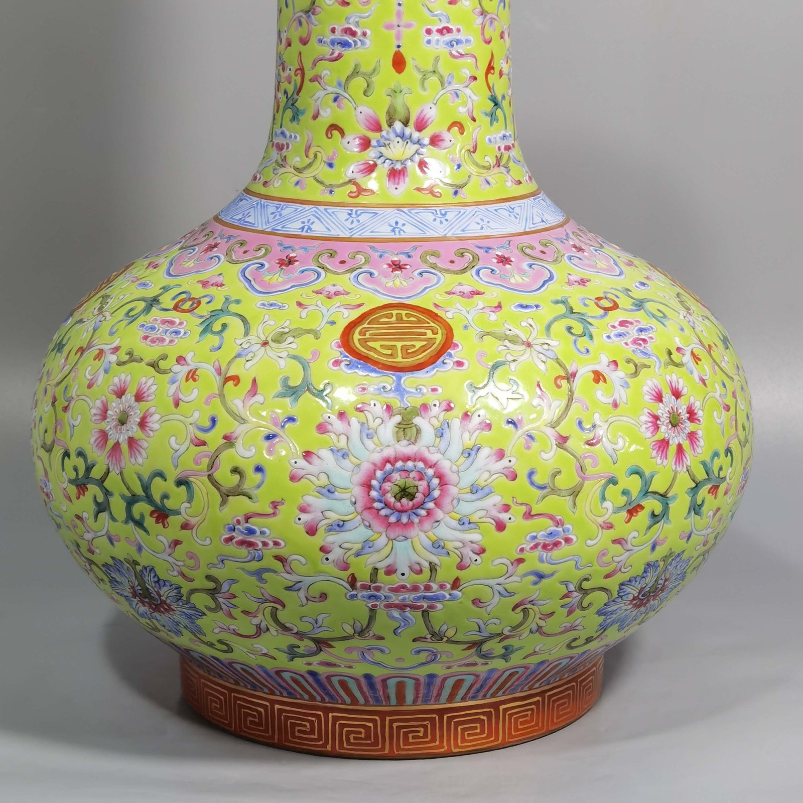 Qing Dynasty Qianlong walnut green land famille rose Fucun celestial sphere vase