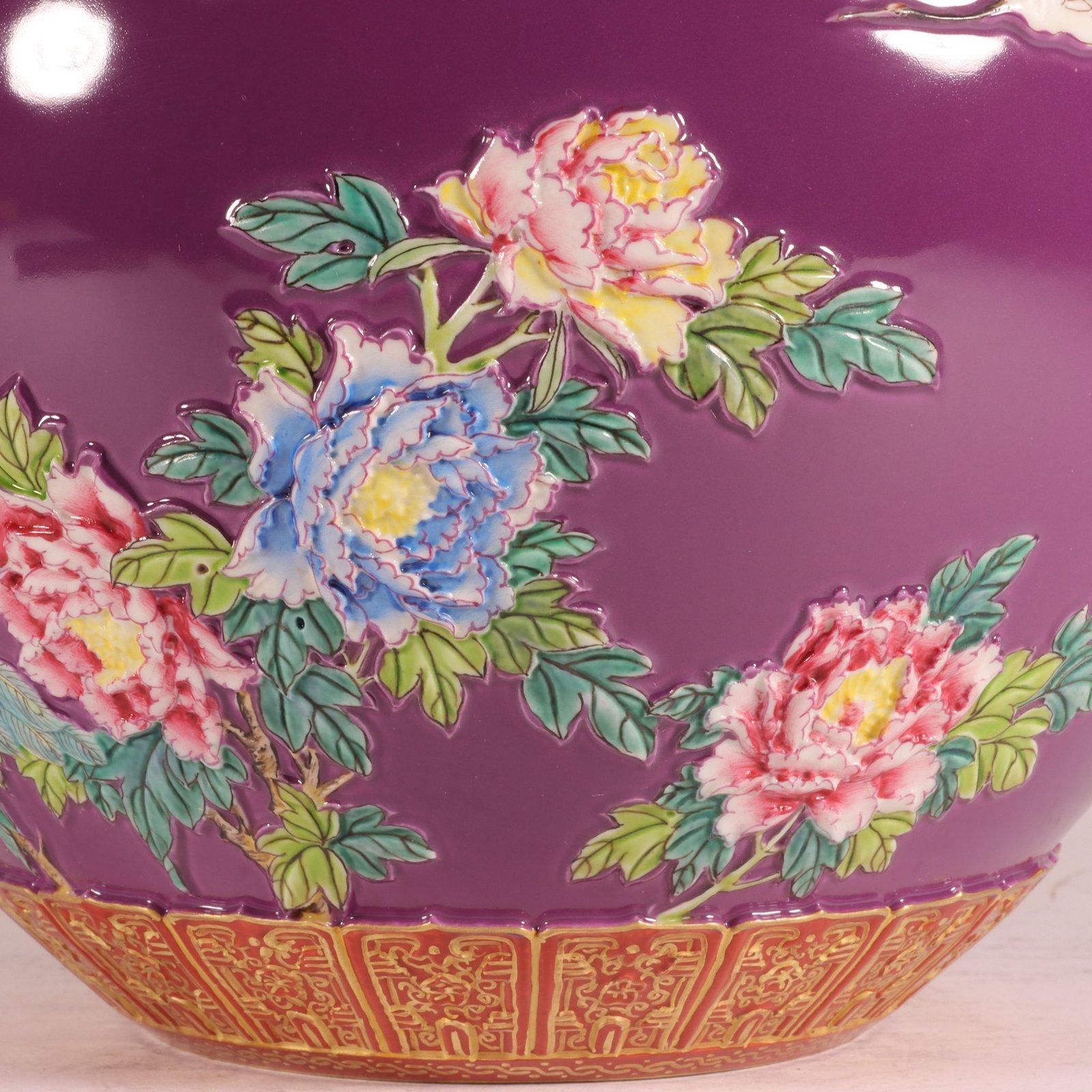 Qing Dynasty Qianlong enamel purple ground carved gold phoenix celestial sphere vase