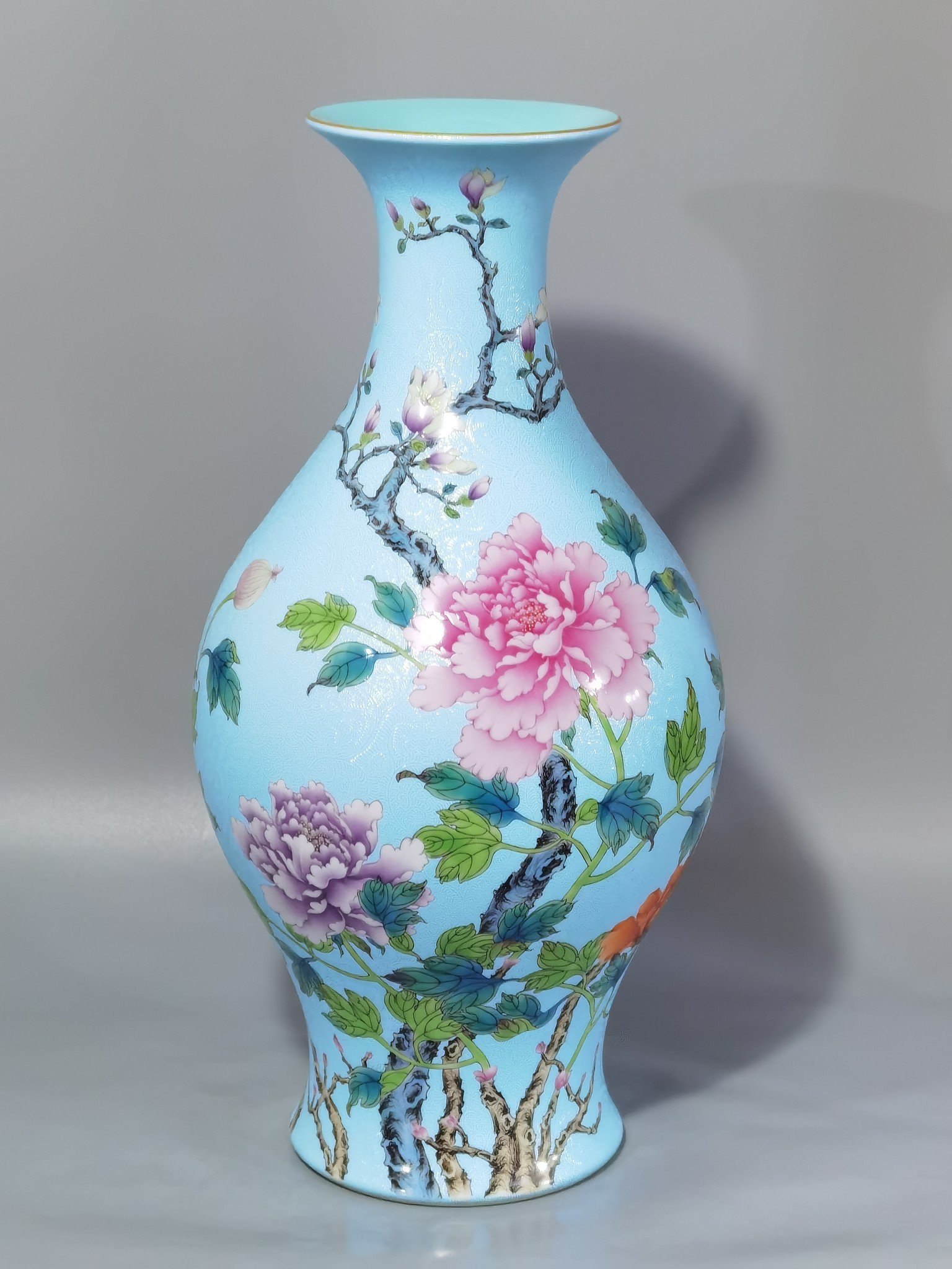 Qing Dynasty Qianlong enamel and rolled peony flower olive vase