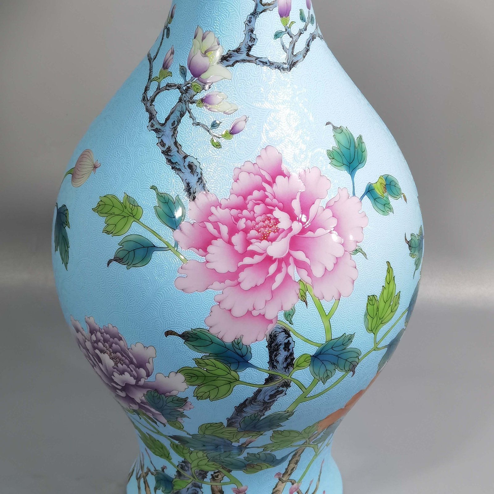 Qing Dynasty Qianlong enamel and rolled peony flower olive vase