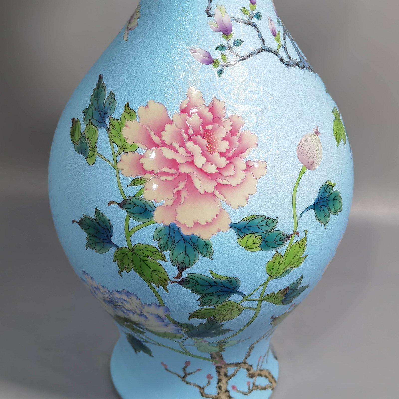 Qing Dynasty Qianlong enamel and rolled peony flower olive vase