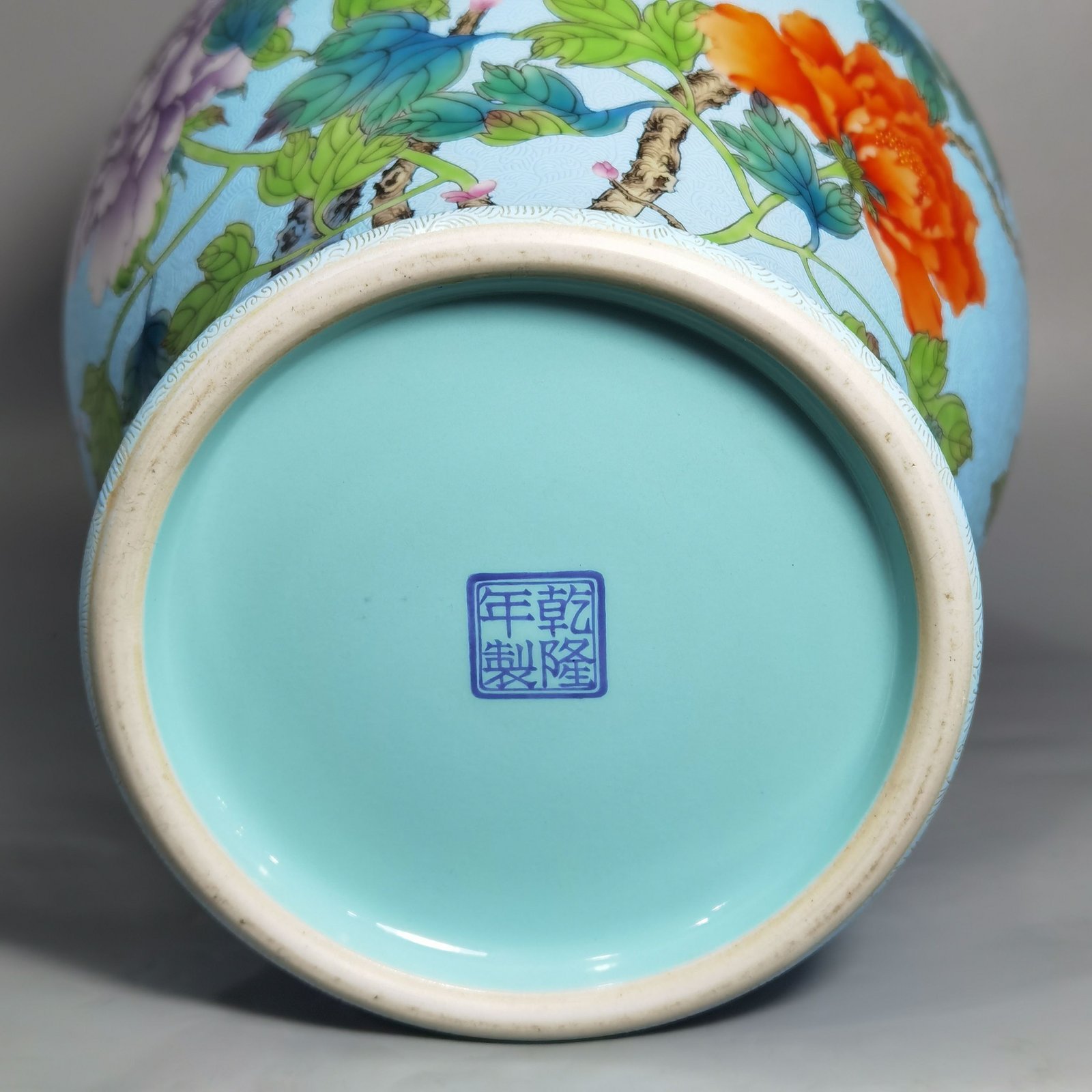 Qing Dynasty Qianlong enamel and rolled peony flower olive vase