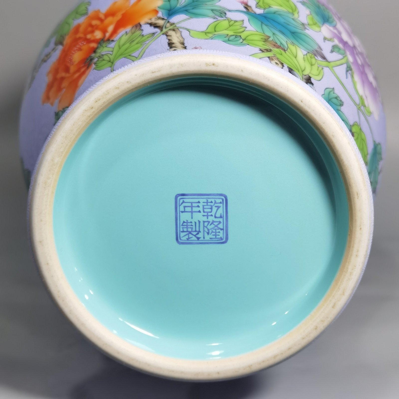 Qing Dynasty Qianlong enamel rolled peony flower olive vase