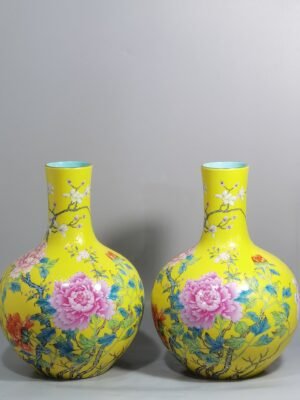 Qing Dynasty Qianlong enamel yellow ground and peony flower celestial vase