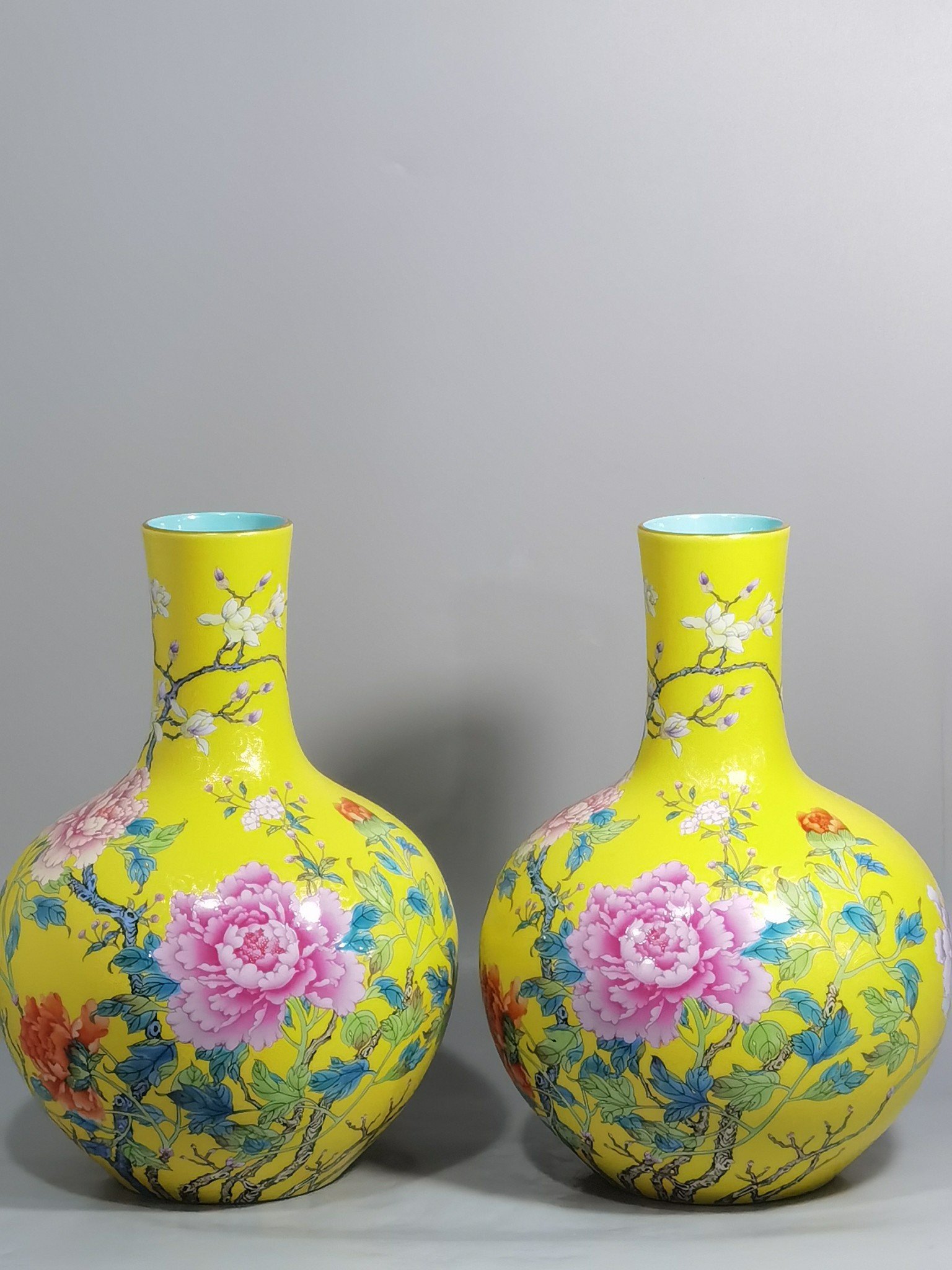 Qing Dynasty Qianlong enamel yellow ground and peony flower celestial vase