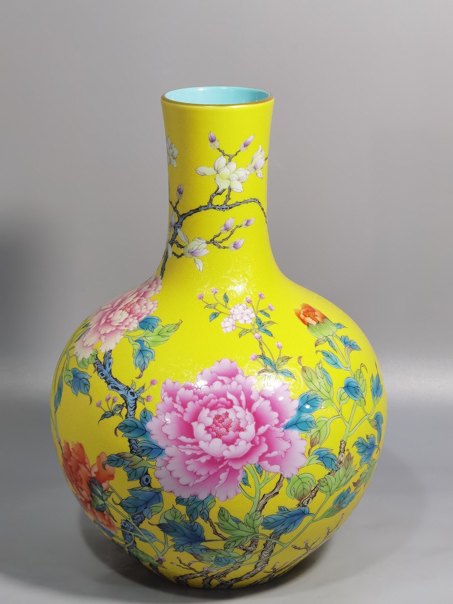 Qing Dynasty Qianlong enamel yellow ground and peony flower celestial vase