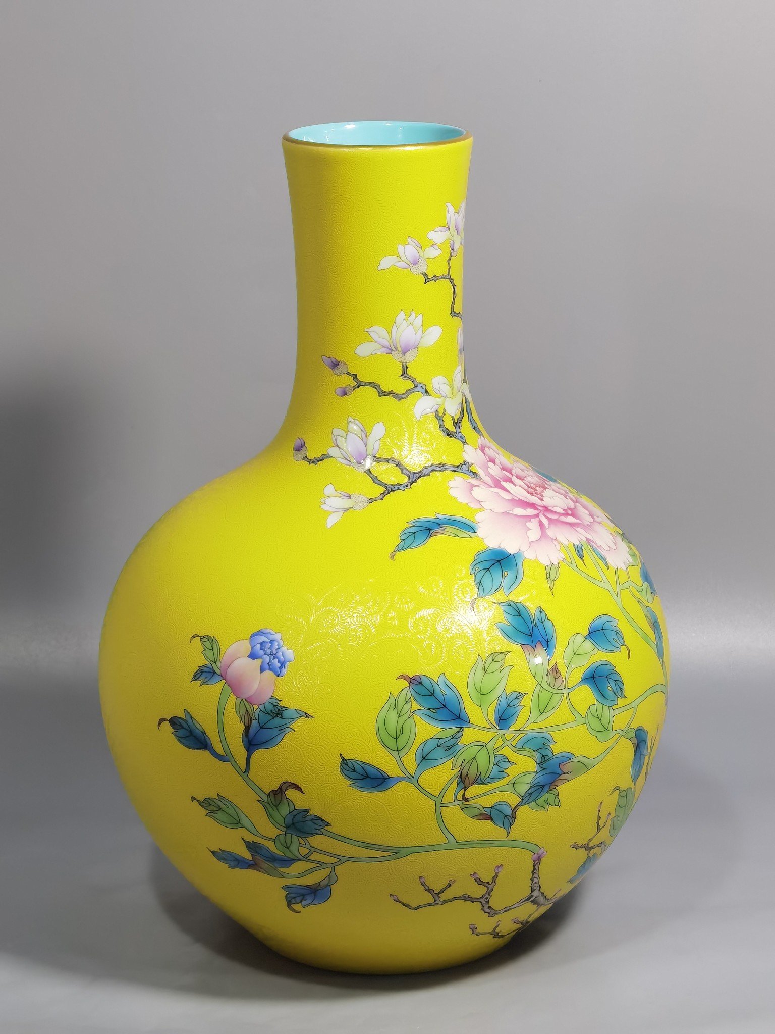 Qing Dynasty Qianlong enamel yellow ground and peony flower celestial vase