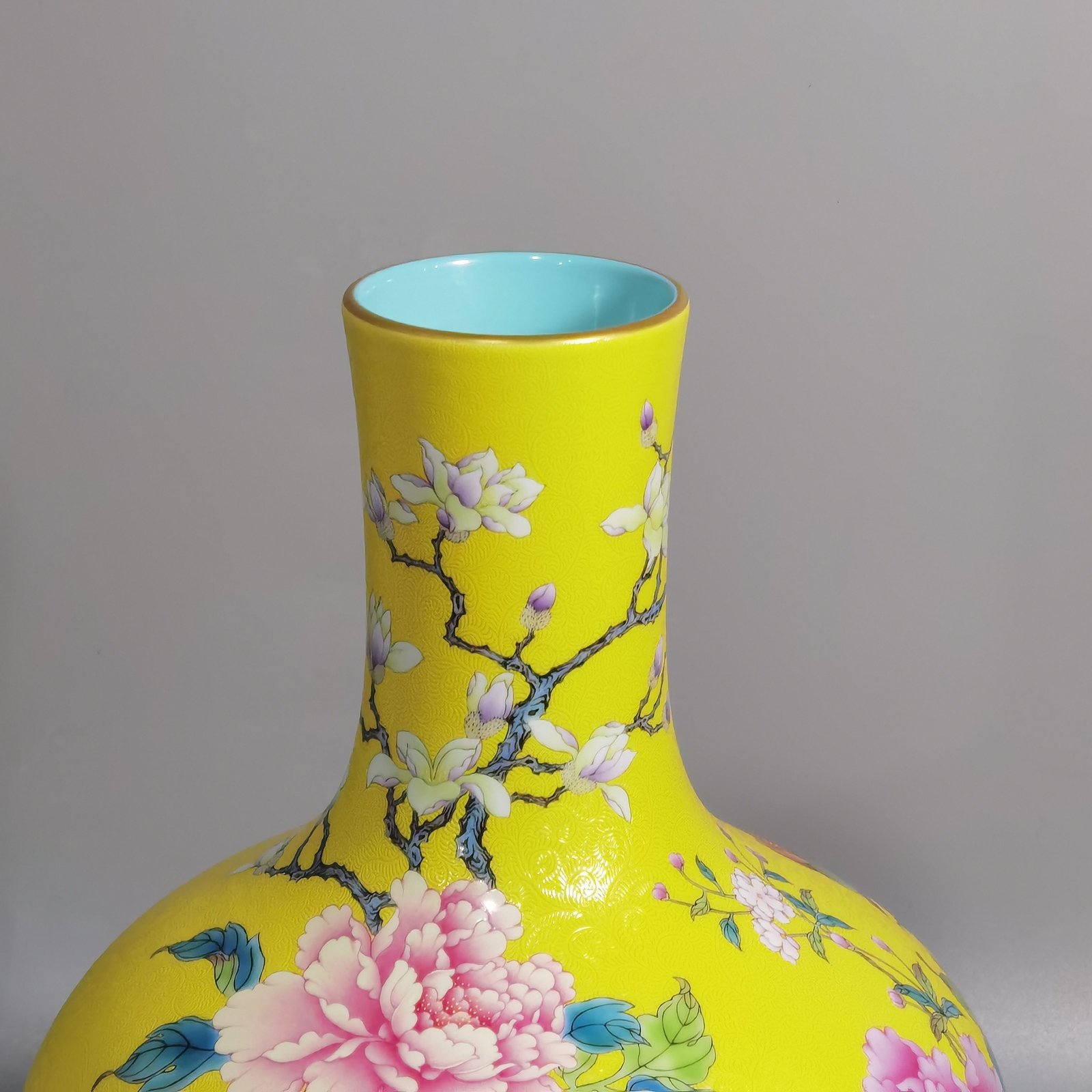 Qing Dynasty Qianlong enamel yellow ground and peony flower celestial vase