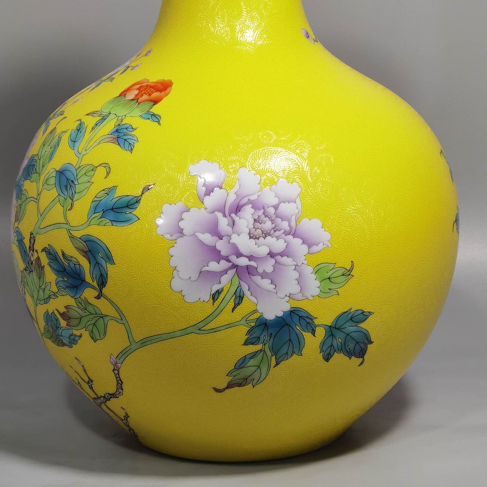 Qing Dynasty Qianlong enamel yellow ground and peony flower celestial vase