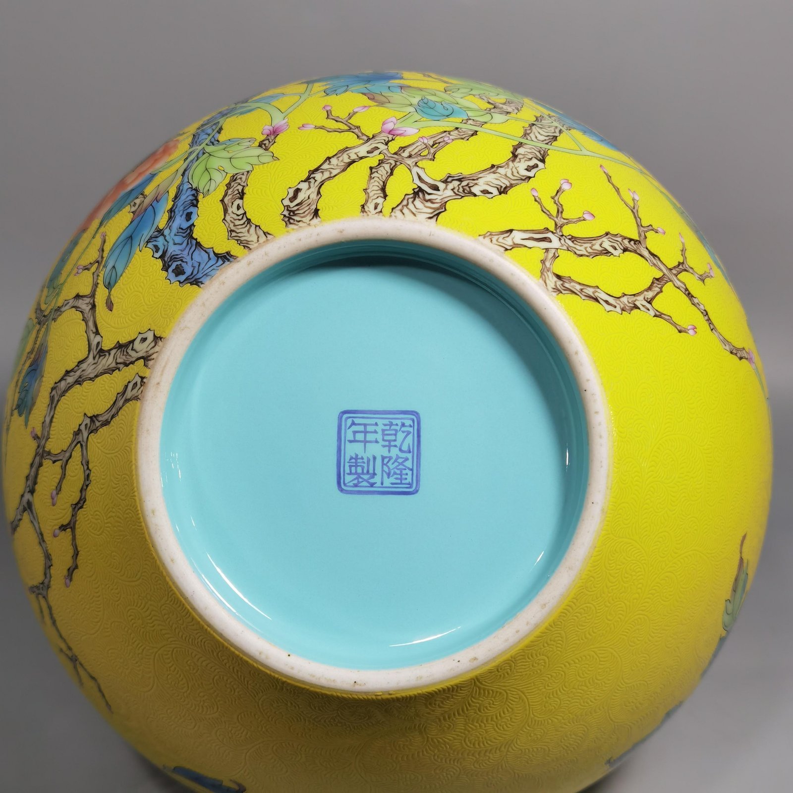 Qing Dynasty Qianlong enamel yellow ground and peony flower celestial vase