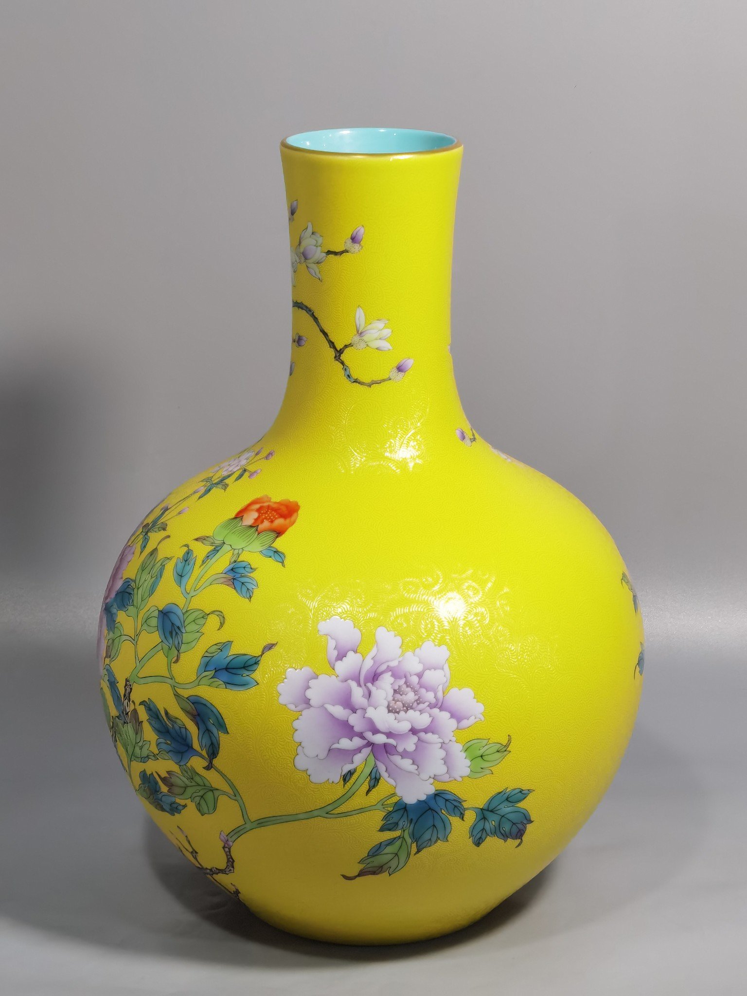 Qing Dynasty Qianlong enamel yellow ground and peony flower celestial vase