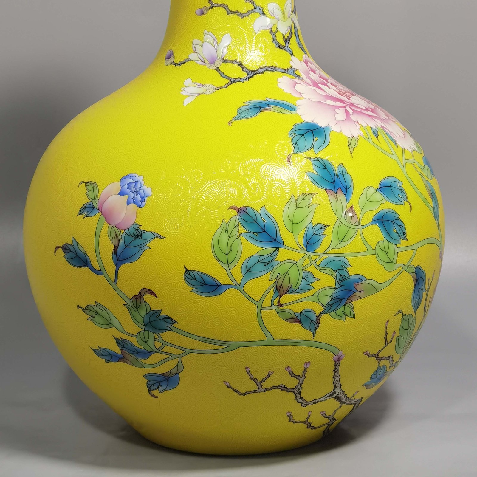 Qing Dynasty Qianlong enamel yellow ground and peony flower celestial vase