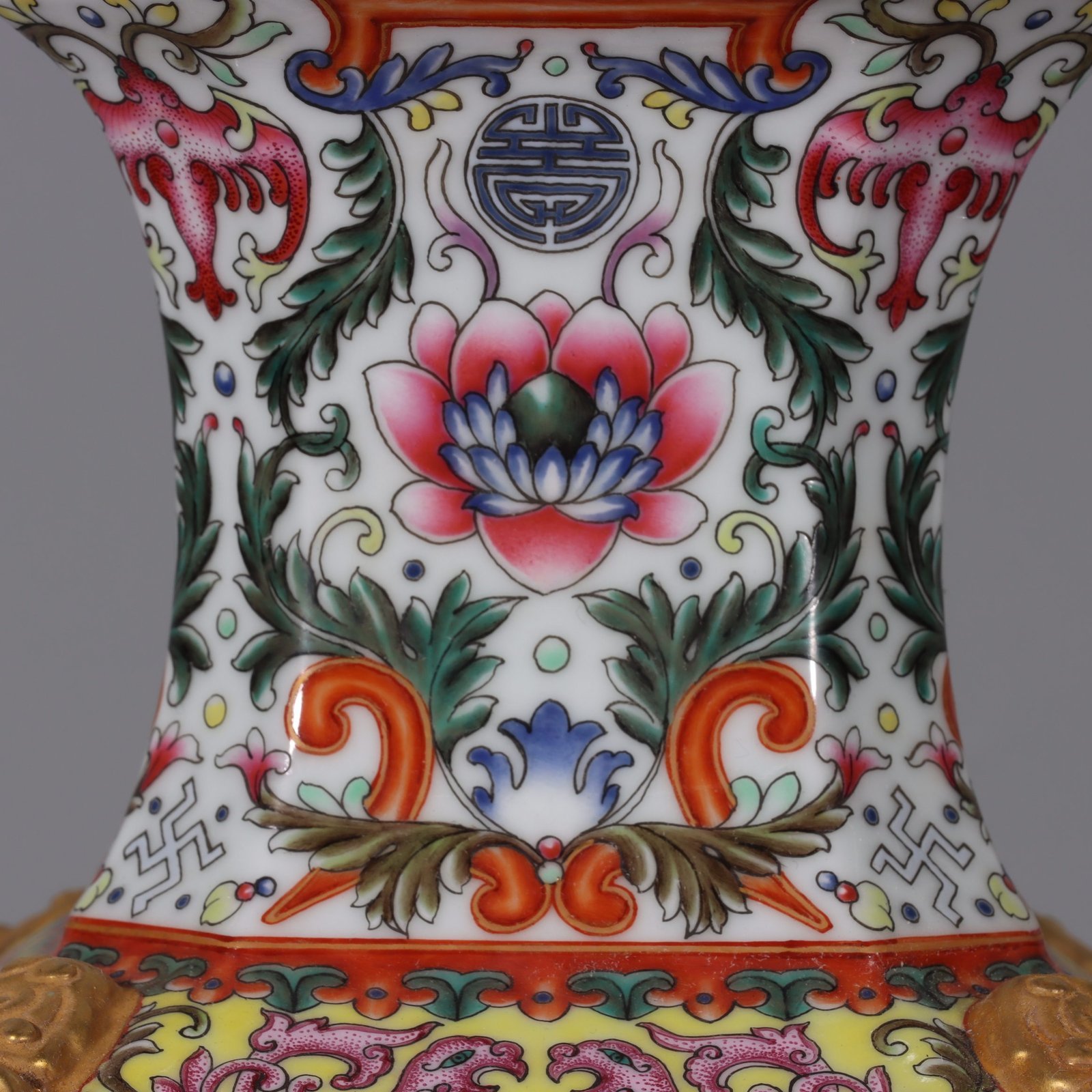 Qing Dynasty Qianlong white ground lotus lotus and lion ear square vase