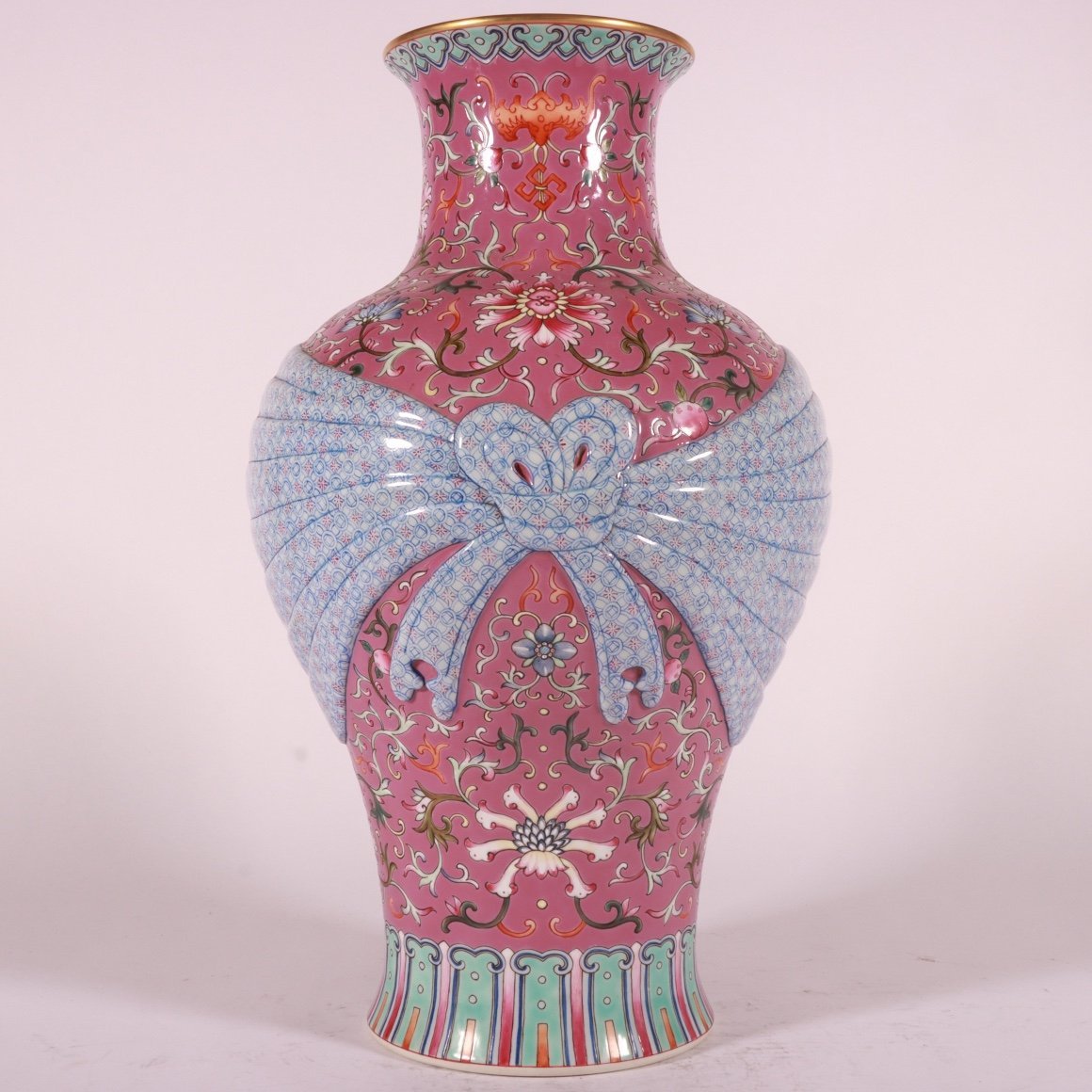 Qing Dynasty Qianlong pastel rouge red ground lotus vase