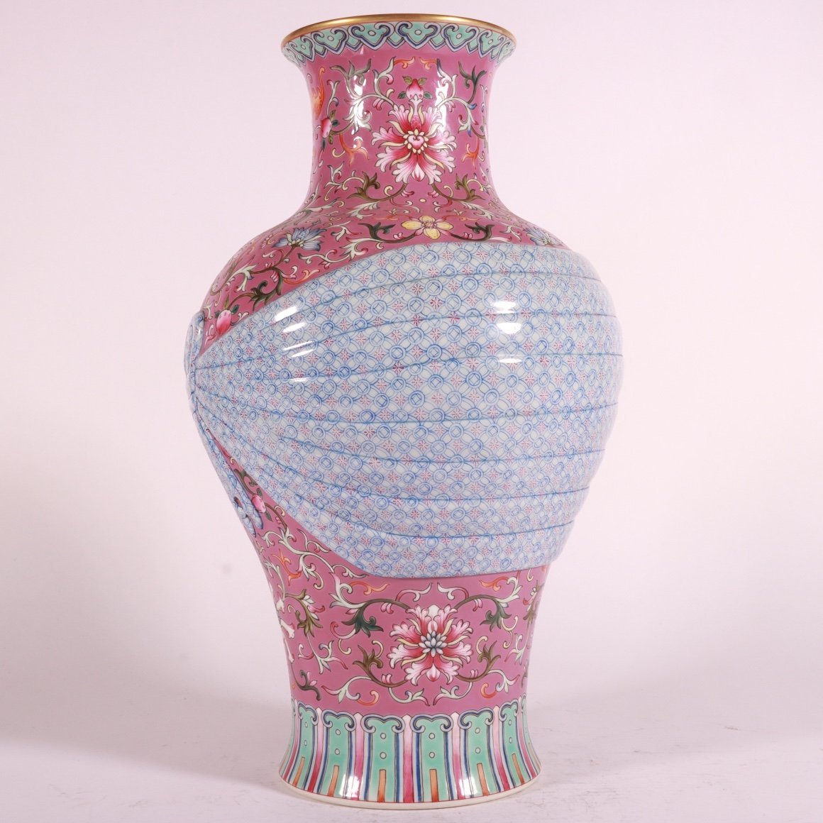 Qing Dynasty Qianlong pastel rouge red ground lotus vase