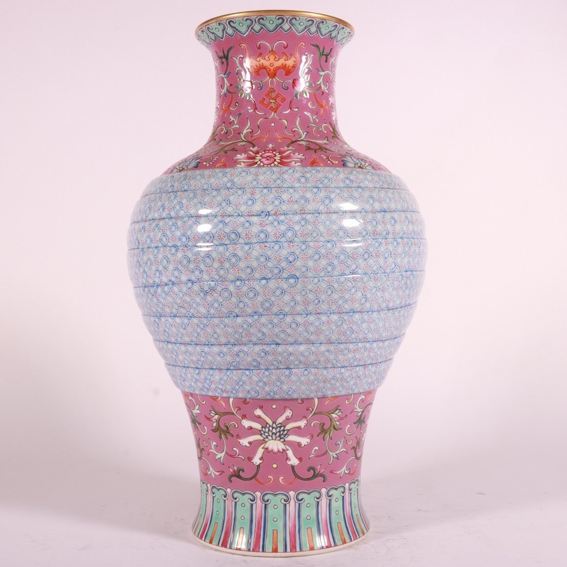 Qing Dynasty Qianlong pastel rouge red ground lotus vase