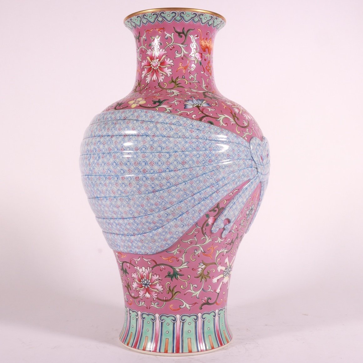 Qing Dynasty Qianlong pastel rouge red ground lotus vase