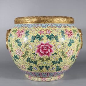 Qing Dynasty Qianlong famille rose yellow ground carved dragon and lotus double-eared vat