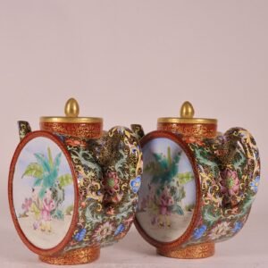 Qing Dynasty Qianlong purple sand and colored black gold glaze and gold-painted window baby play pot