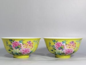 Qing Dynasty Qianlong enamel yellow ground peony and flower palace bowls