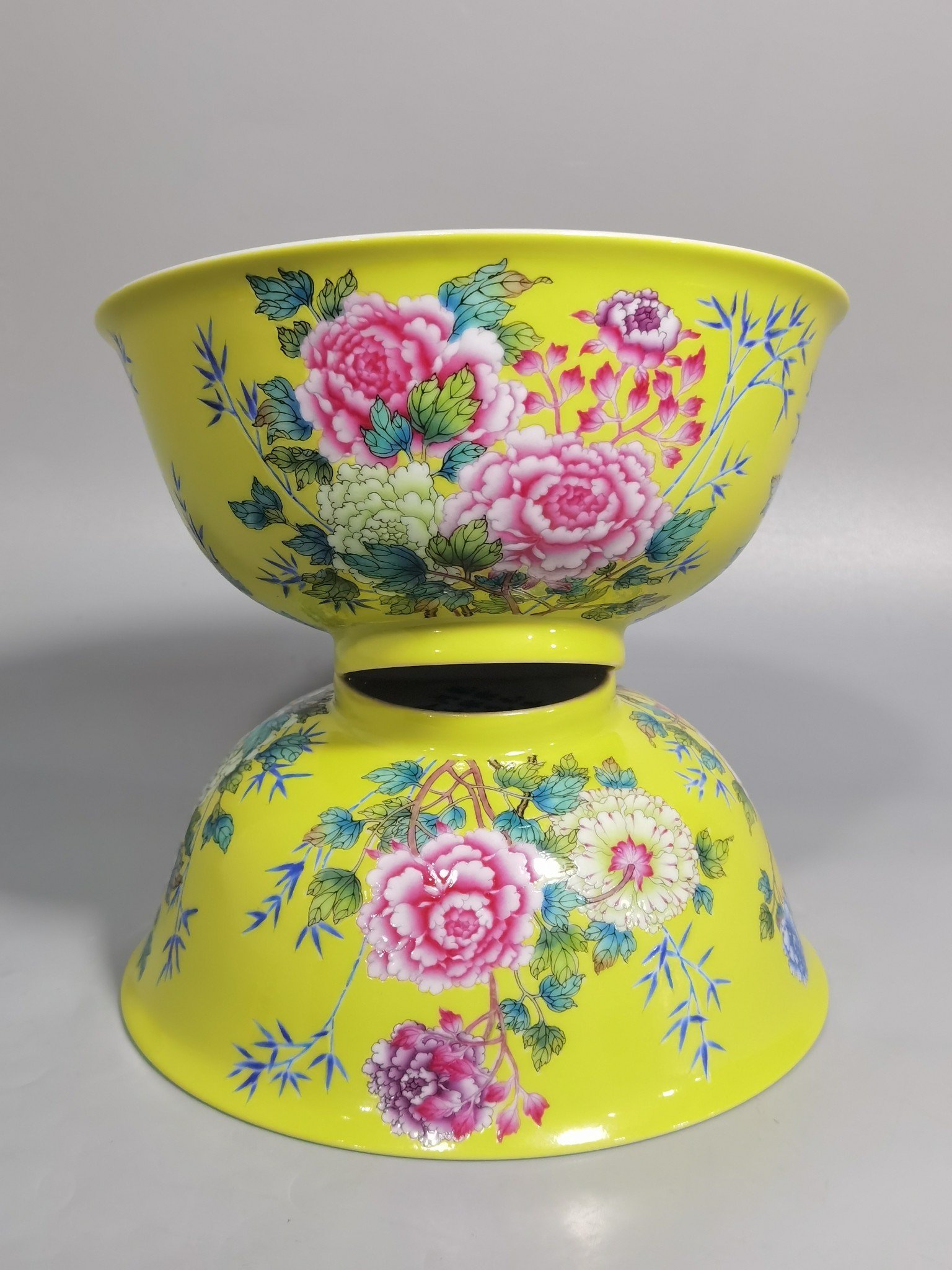 Qing Dynasty Qianlong enamel yellow ground peony and flower palace bowls
