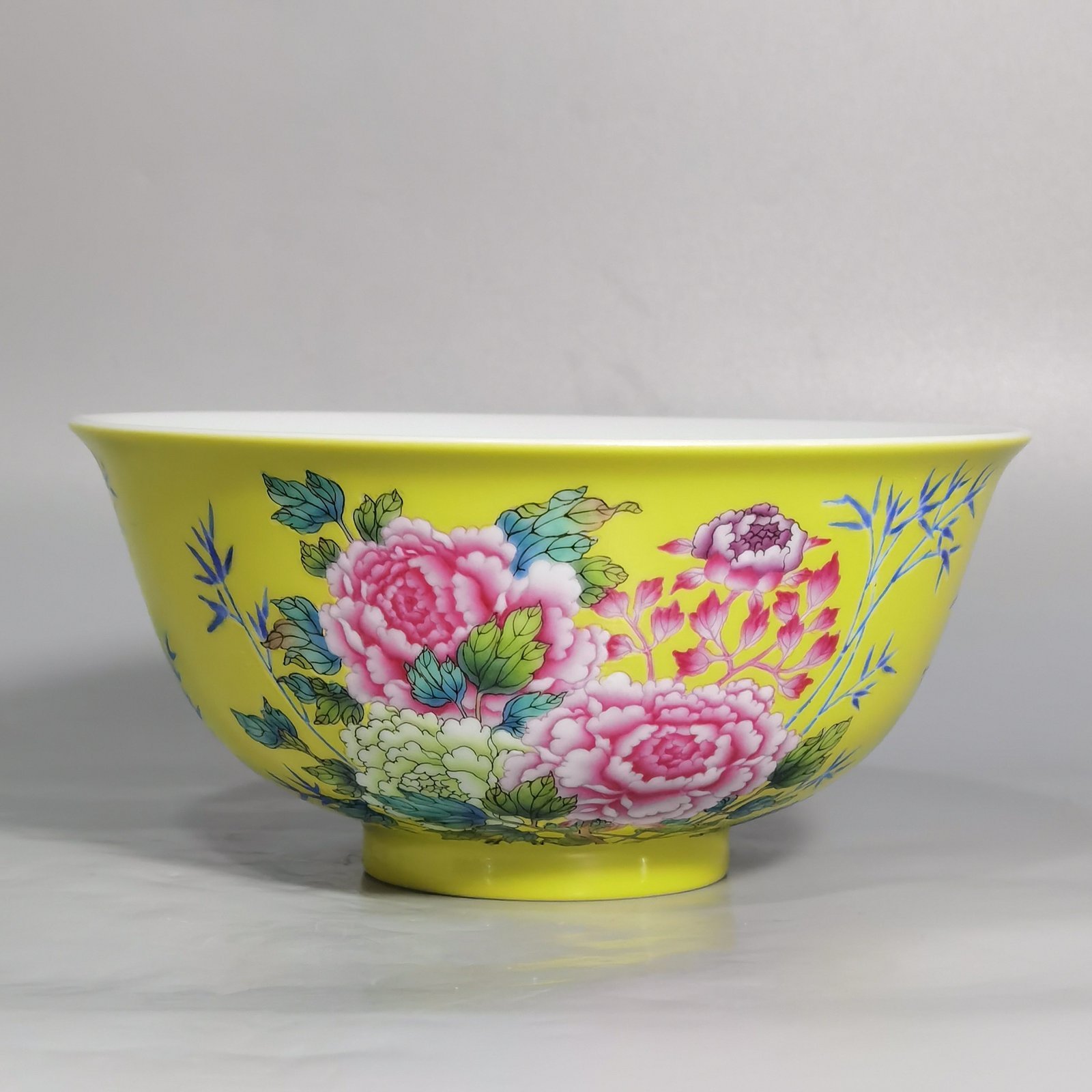 Qing Dynasty Qianlong enamel yellow ground peony and flower palace bowls