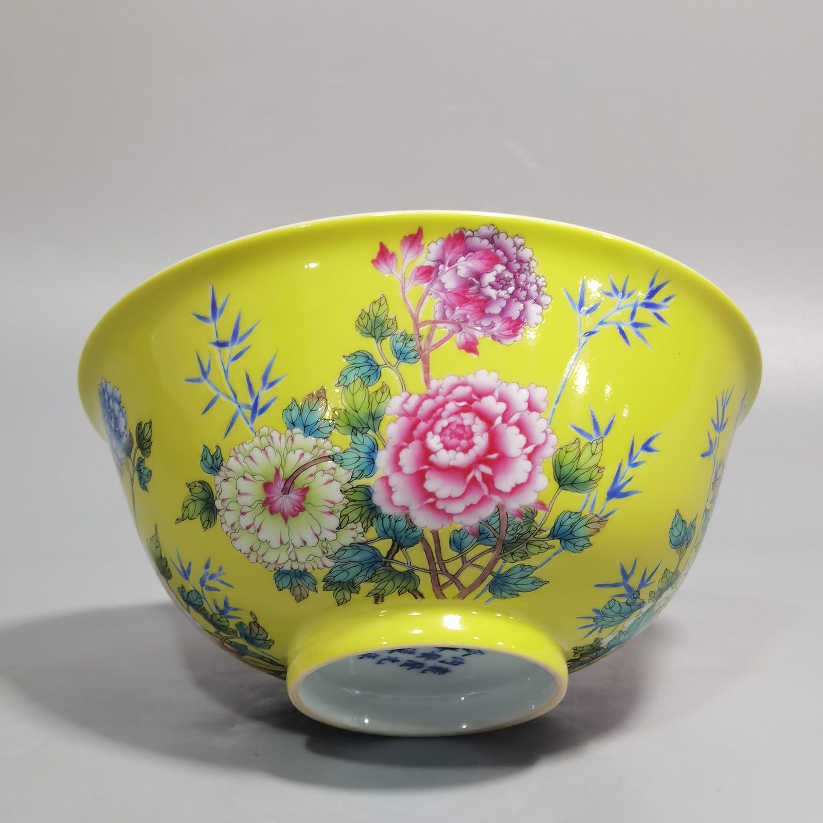 Qing Dynasty Qianlong enamel yellow ground peony and flower palace bowls