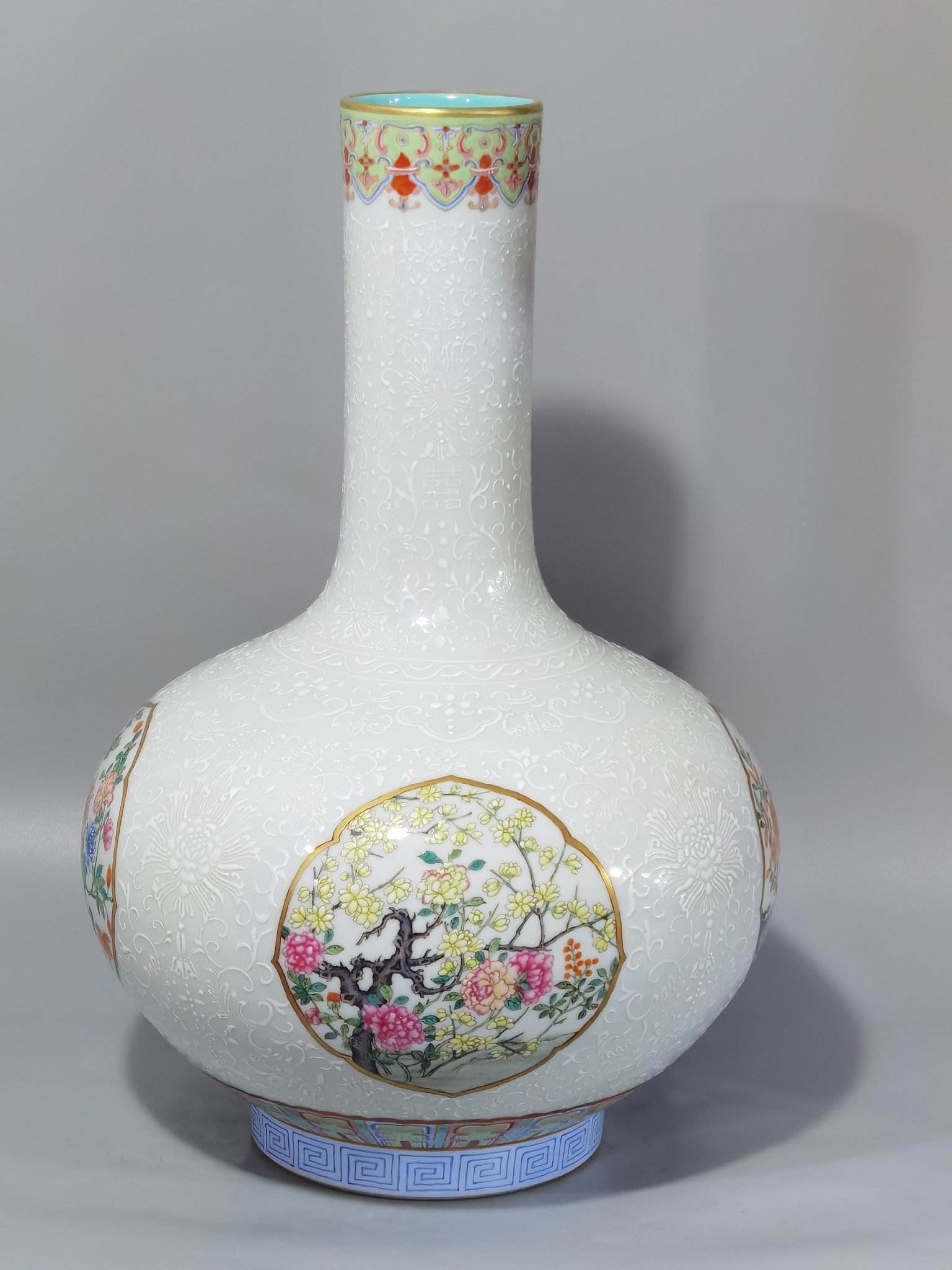 Qing Dynasty Qianlong white pastel window with four seasons flowers celestial sphere vase