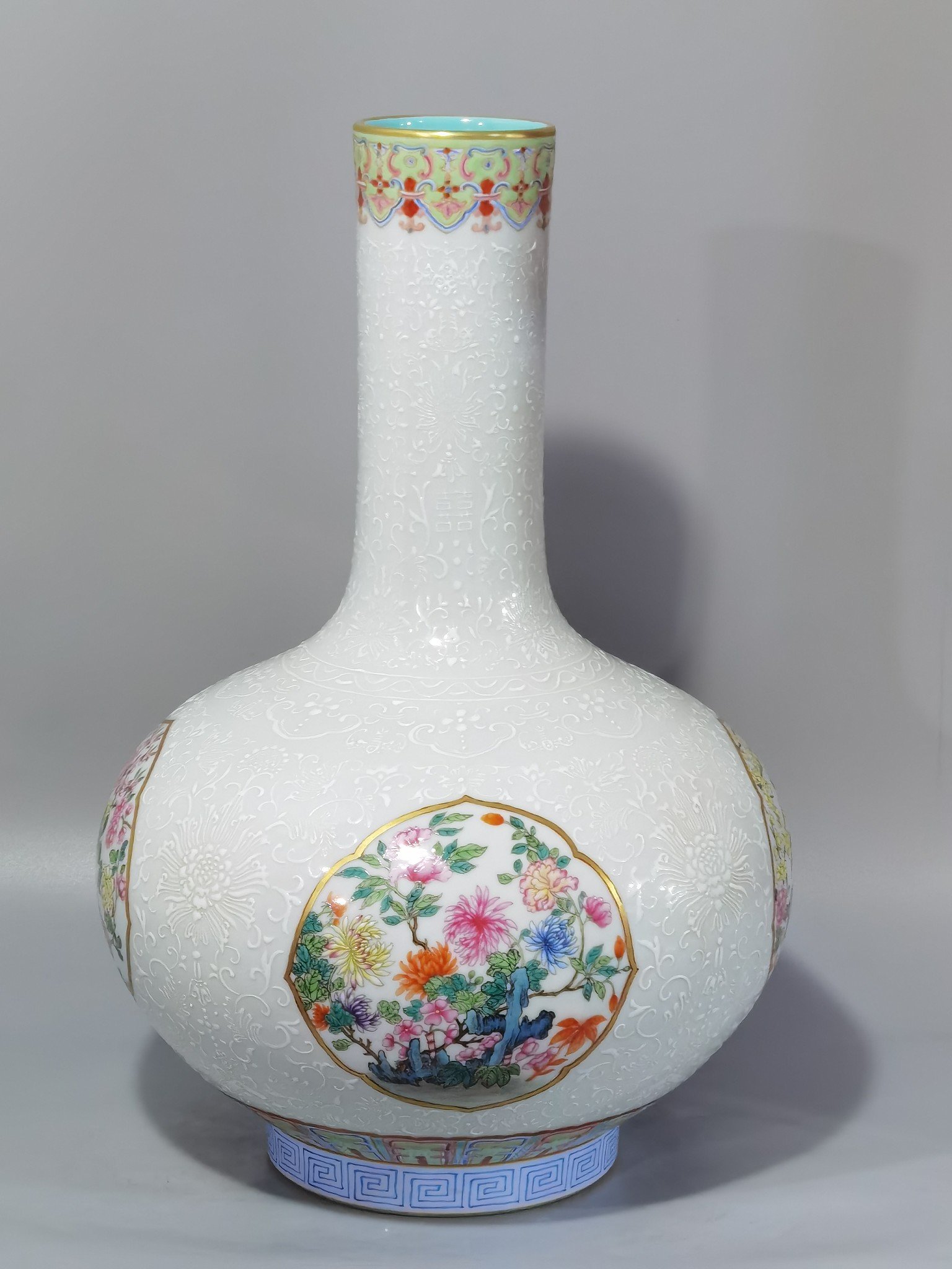Qing Dynasty Qianlong white pastel window with four seasons flowers celestial sphere vase