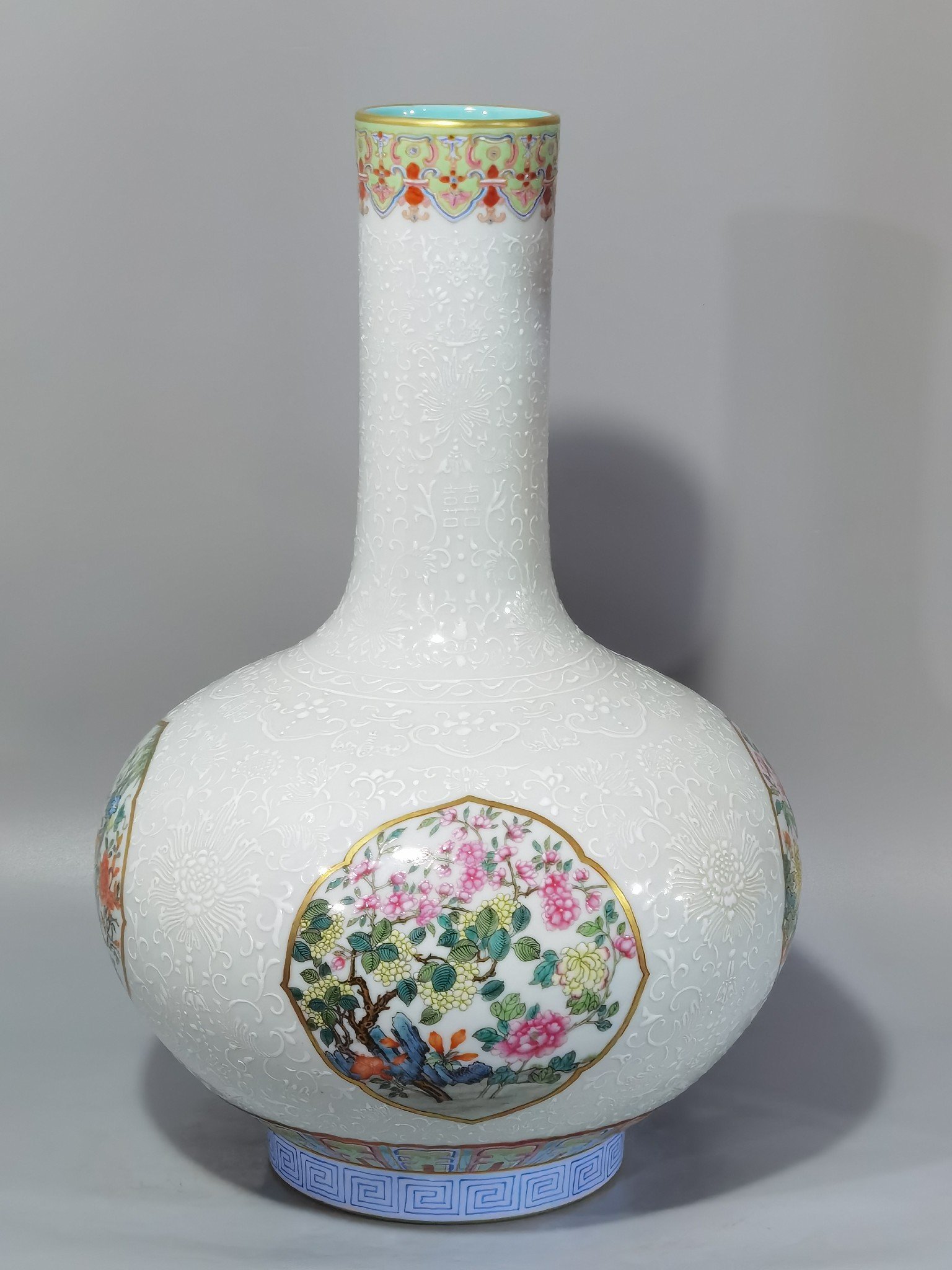 Qing Dynasty Qianlong white pastel window with four seasons flowers celestial sphere vase