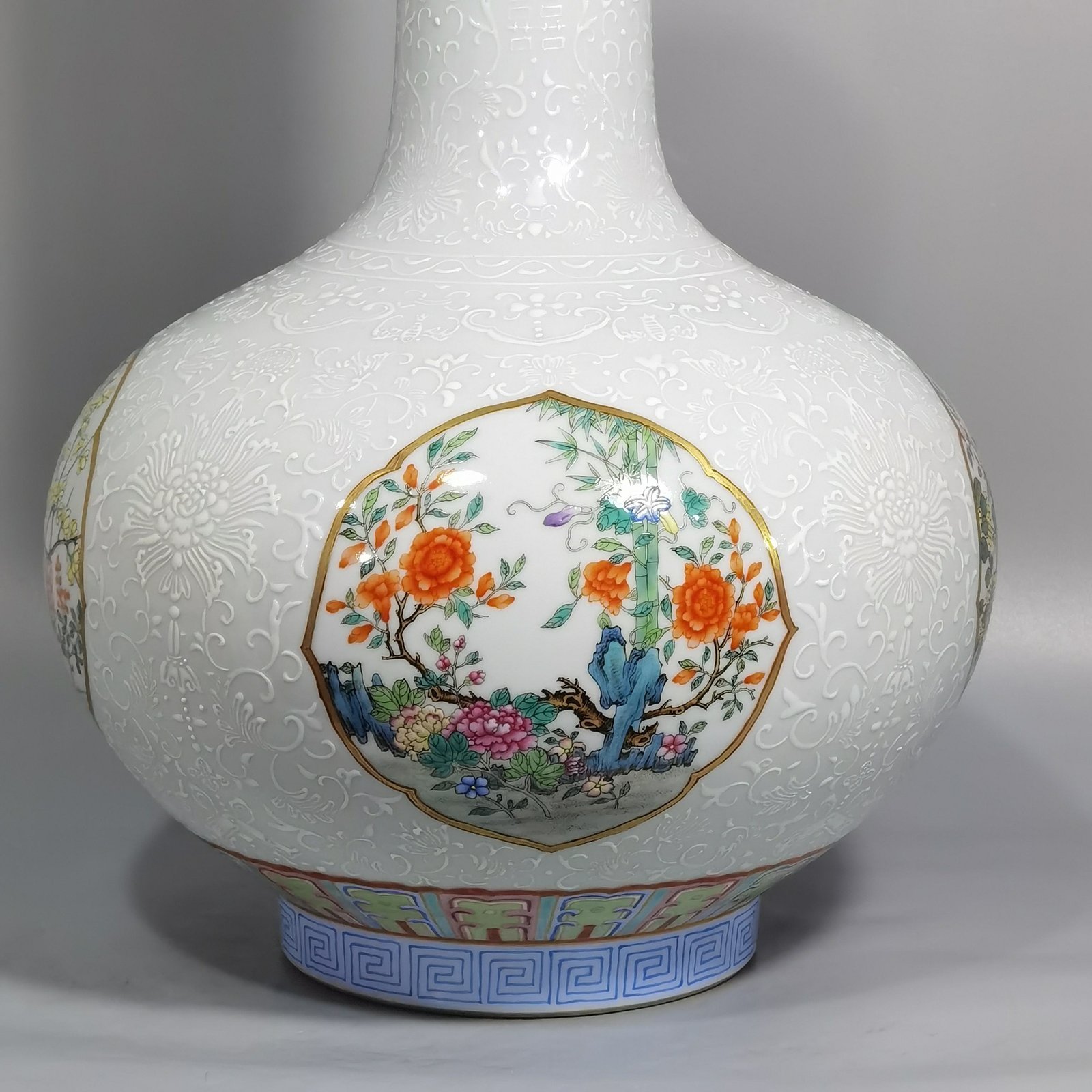 Qing Dynasty Qianlong white pastel window with four seasons flowers celestial sphere vase