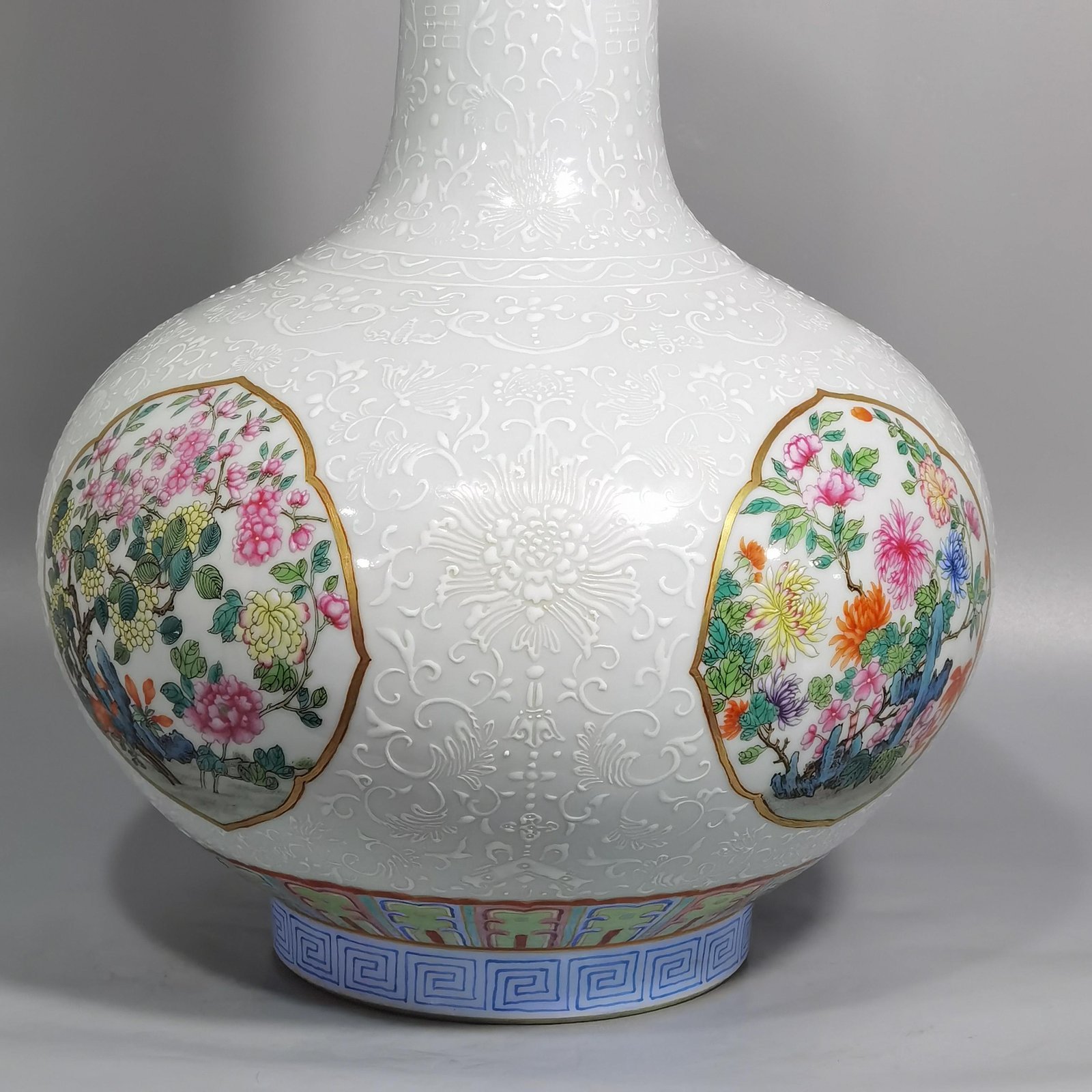 Qing Dynasty Qianlong white pastel window with four seasons flowers celestial sphere vase