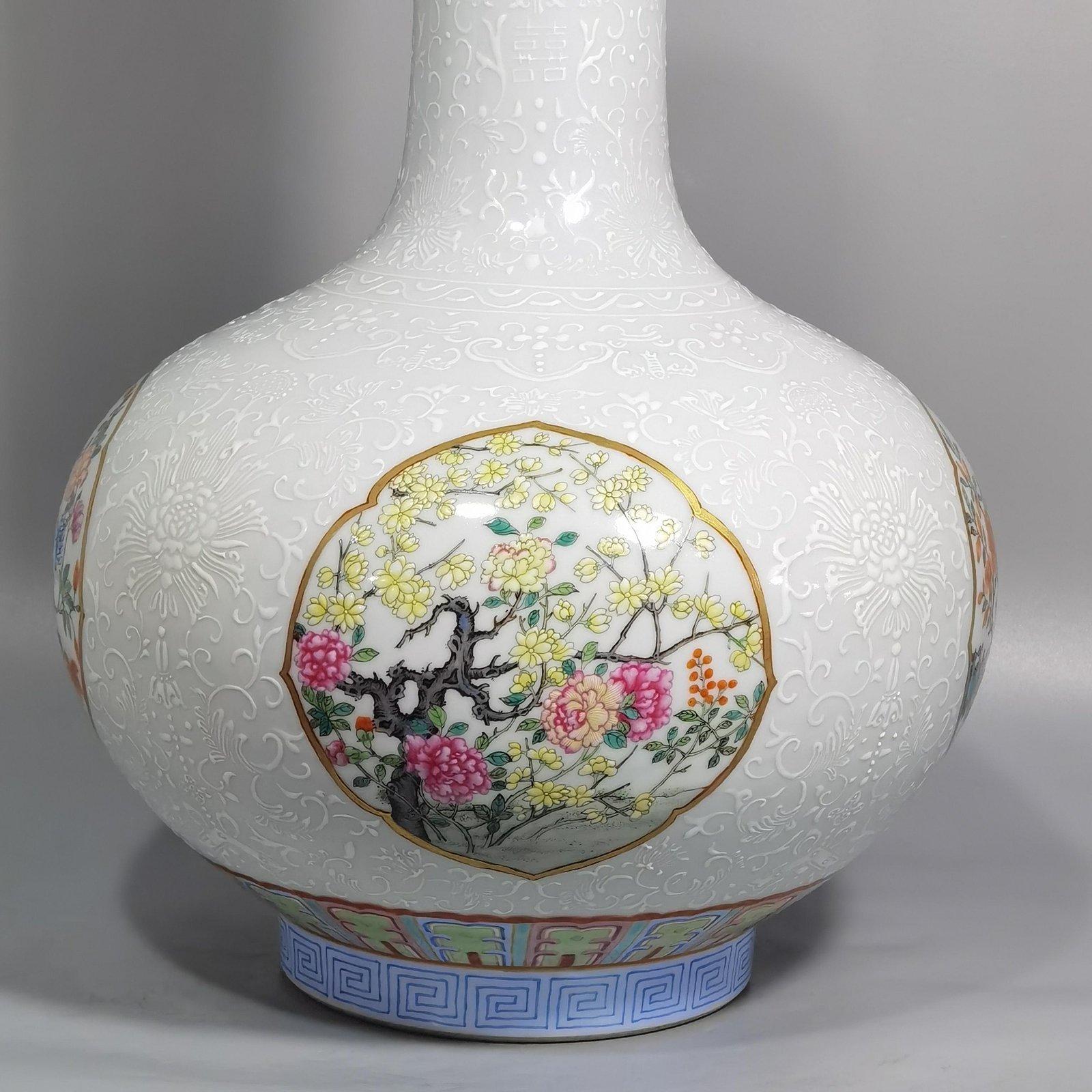 Qing Dynasty Qianlong white pastel window with four seasons flowers celestial sphere vase