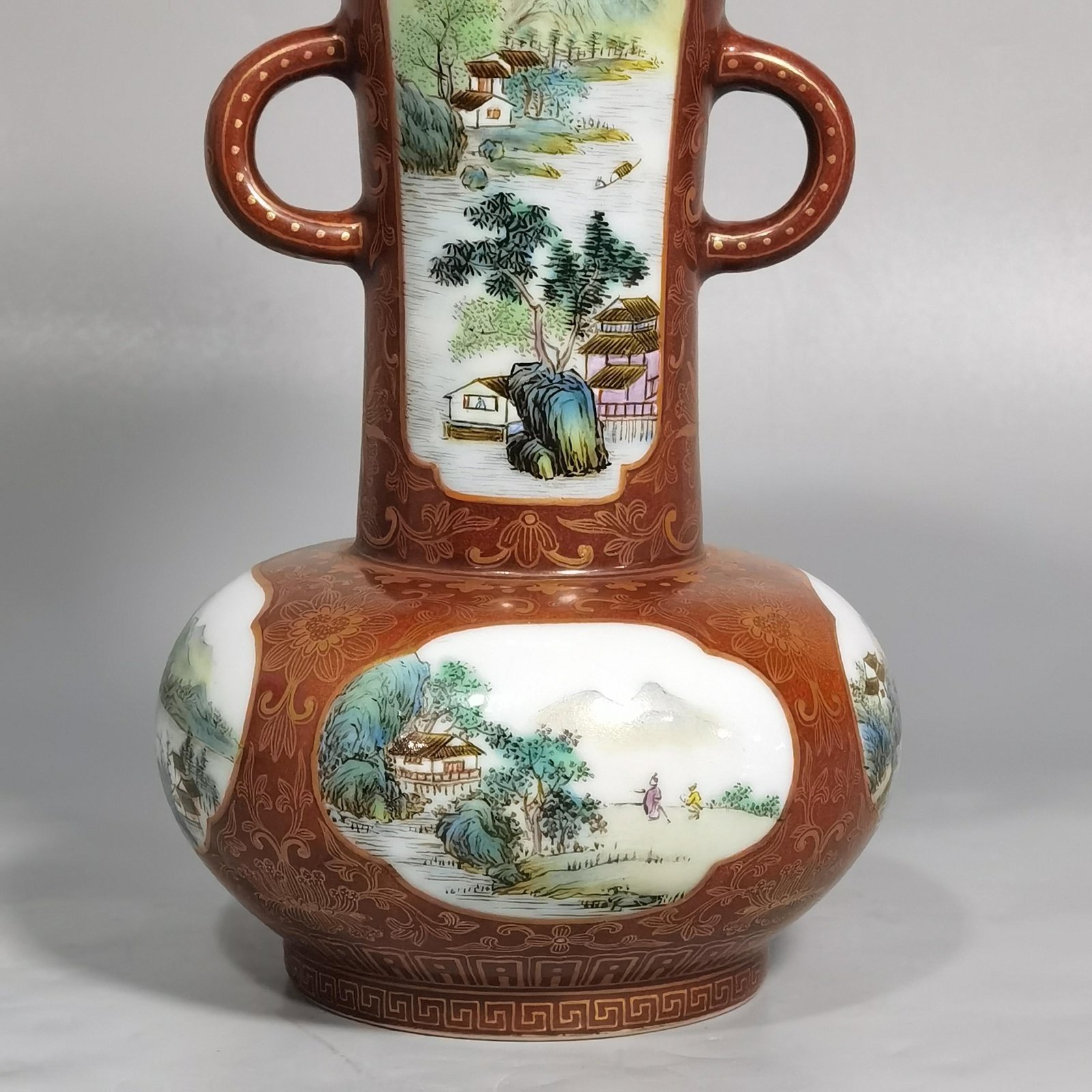 Qing Dynasty Qianlong gold-painted double-eared flower vase with window