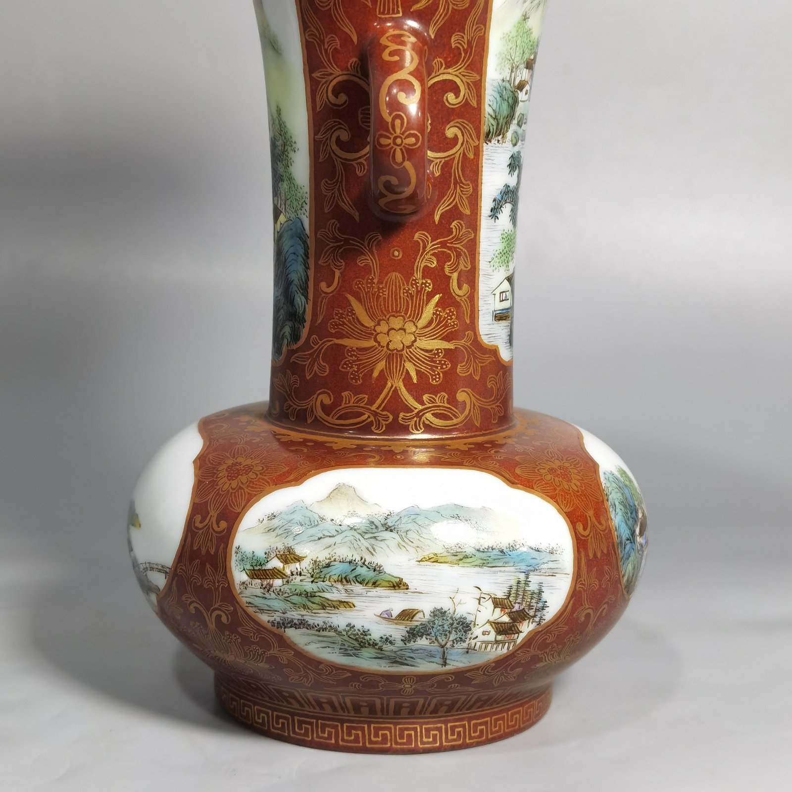 Qing Dynasty Qianlong gold-painted double-eared flower vase with window
