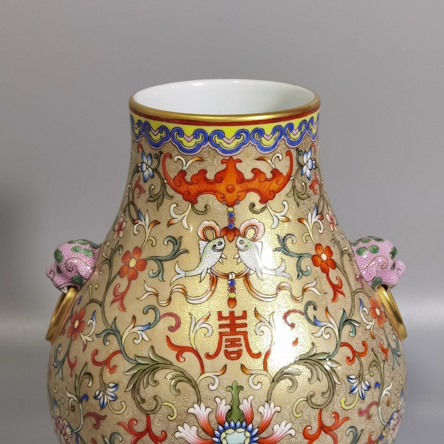 Qing Dynasty Qianlong period longevity flower flower and nimal ear statues