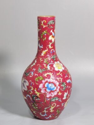 Qing Dynasty Qianlong Yangcai rouge red ground flowered olive vase