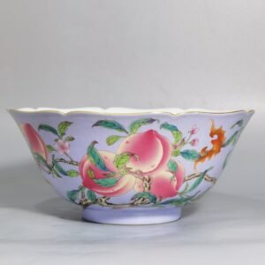 Qing Dynasty Qianlong lavender ground-rolled pastel nine-peach pattern Kui mouth bowl