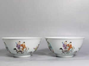 Qing Dynasty Qianlong pair of enamel baby playing bowls
