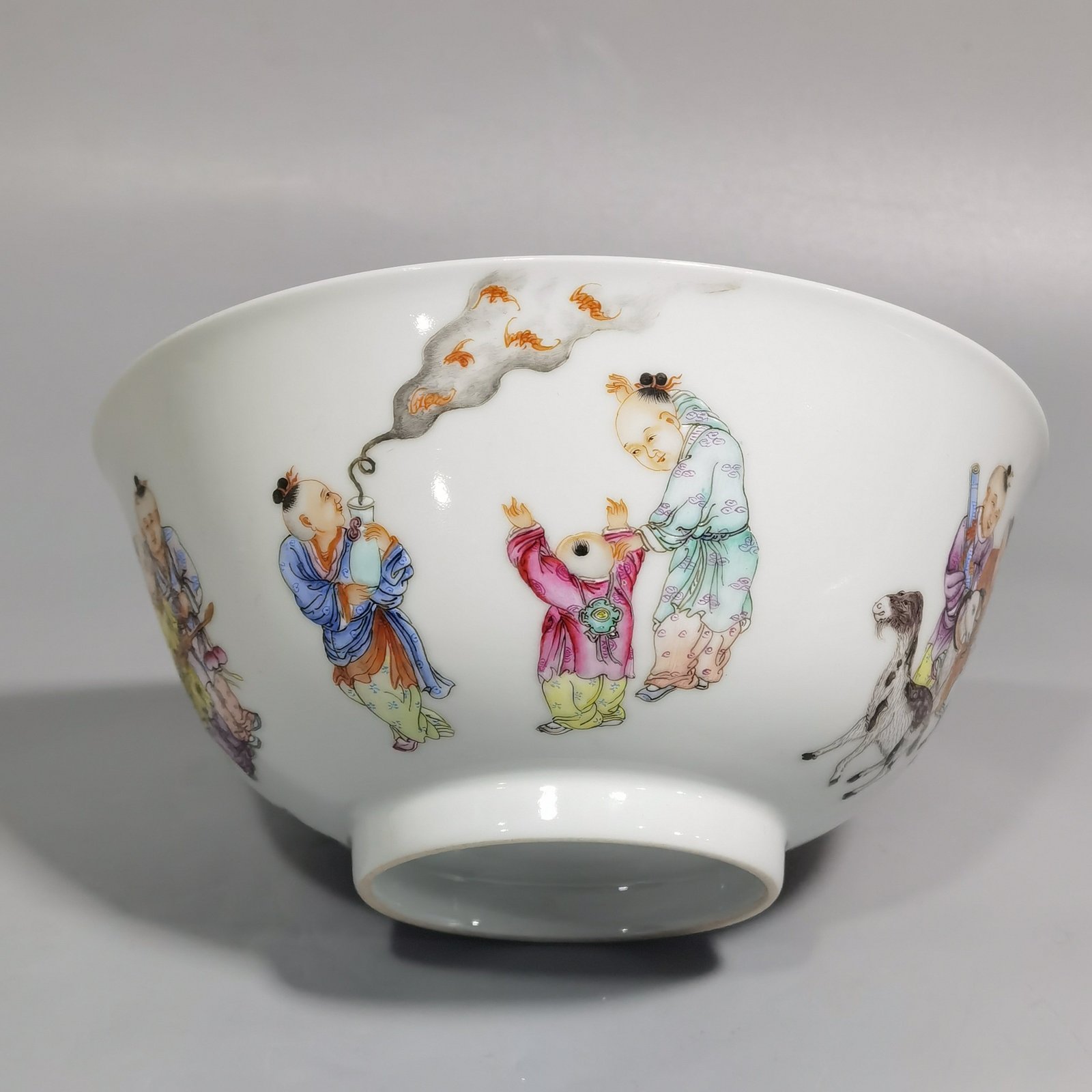 Qing Dynasty Qianlong pair of enamel baby playing bowls