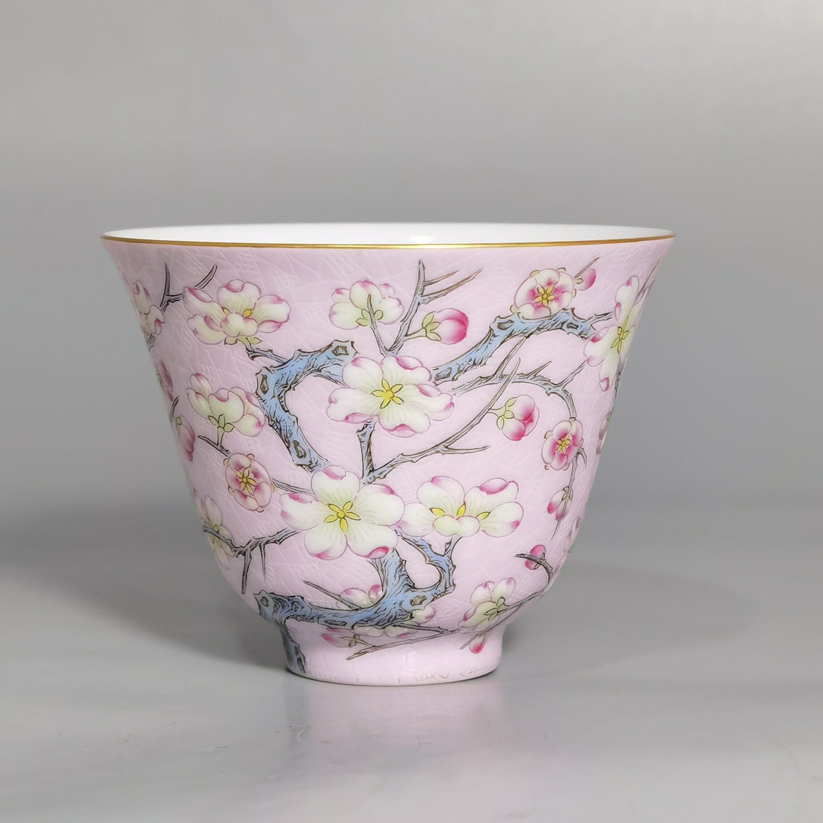 Qing Dynasty Qianlong pair of enamel pink ground plum blossom cups