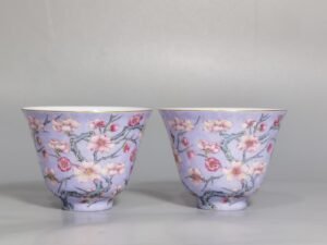 Qing Dynasty Qianlong pair of enamel blue ground plum blossom cups