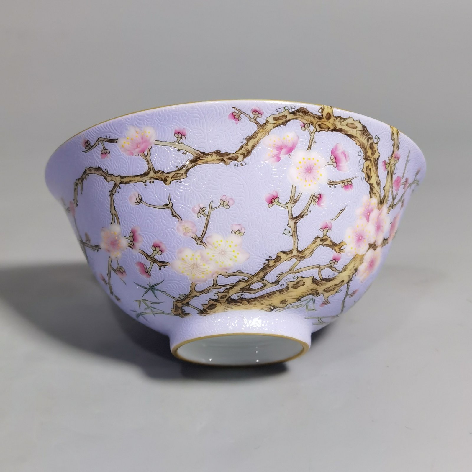 Qing Dynasty Qianlong pair of enamel-rolled plum blossom tea rounds