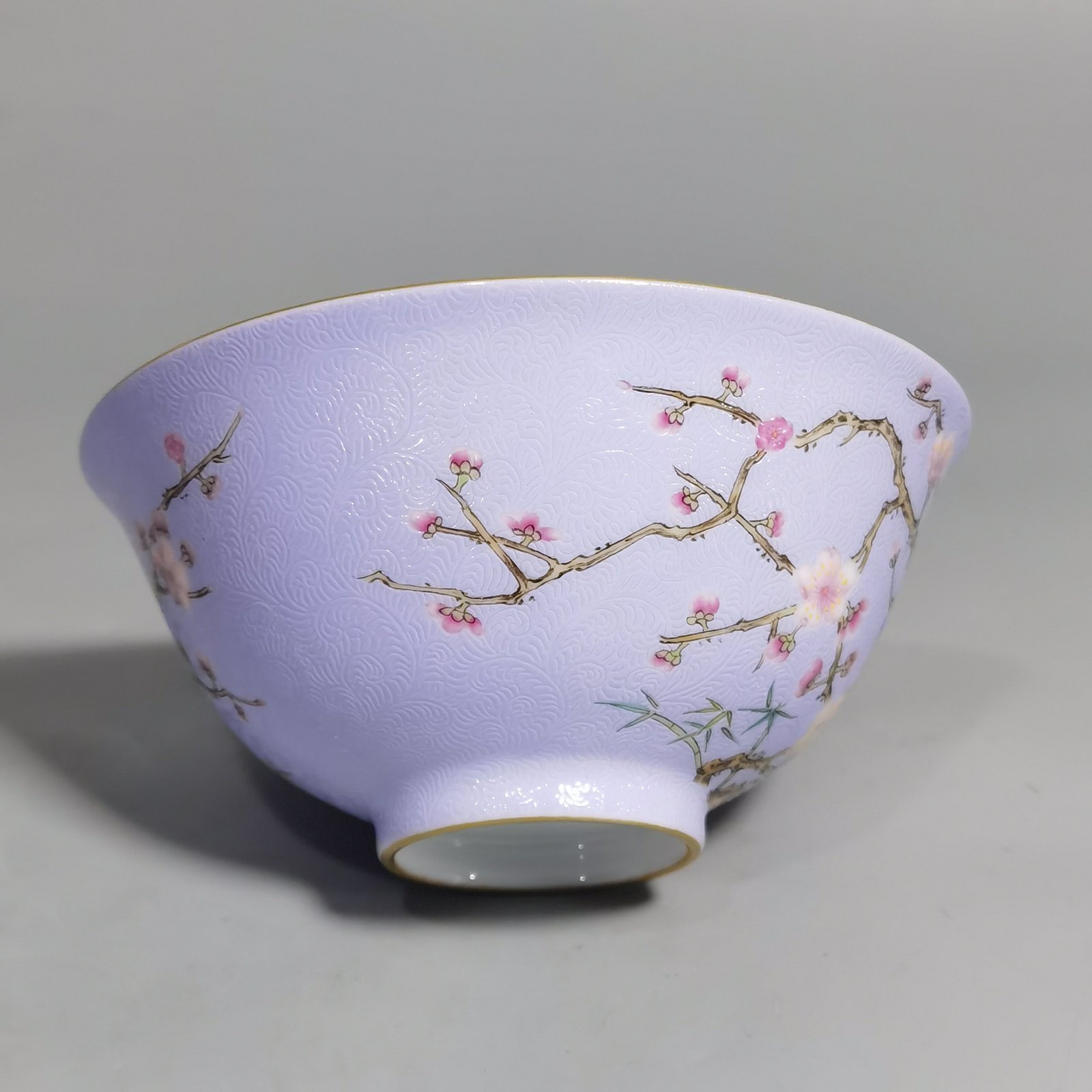 Qing Dynasty Qianlong pair of enamel-rolled plum blossom tea rounds