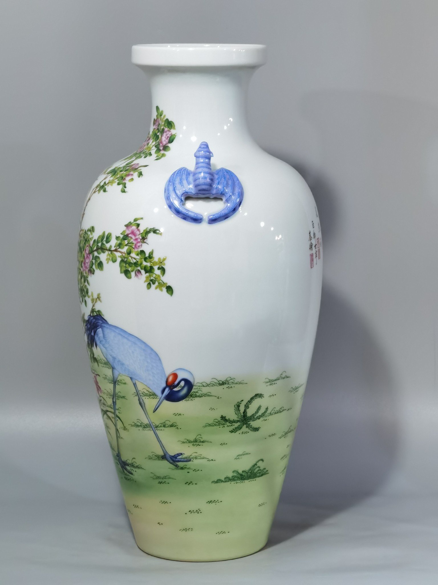 Qing Dynasty Qianlong pair of enamel Castiglione double-crane and flower-pattern bat-eared vases