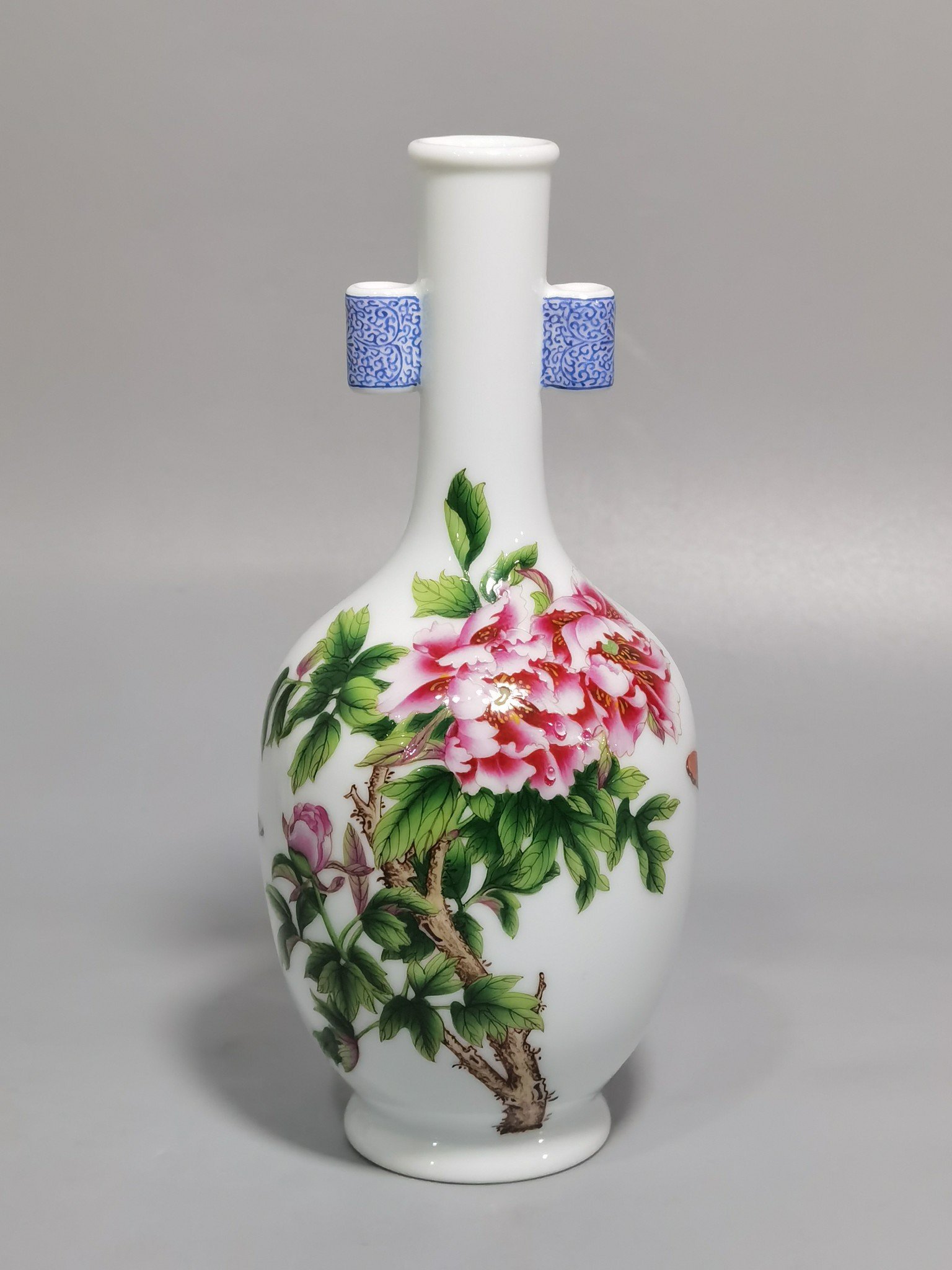 Qing Dynasty Qianlong pair of enamel Castiglione flower blooming wealth vases