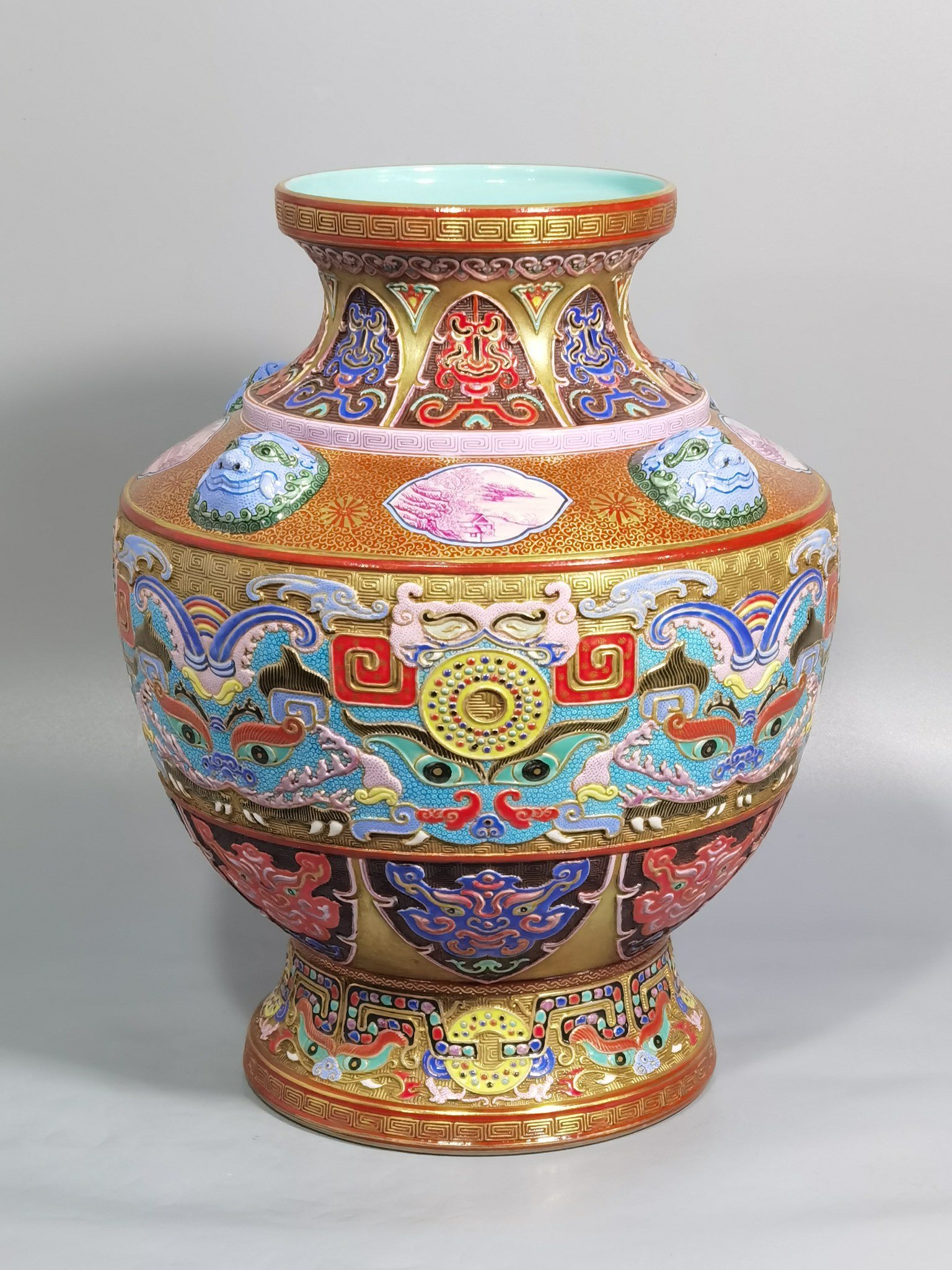 Qing Dynasty Qianlong enamel color gold ground ear statue